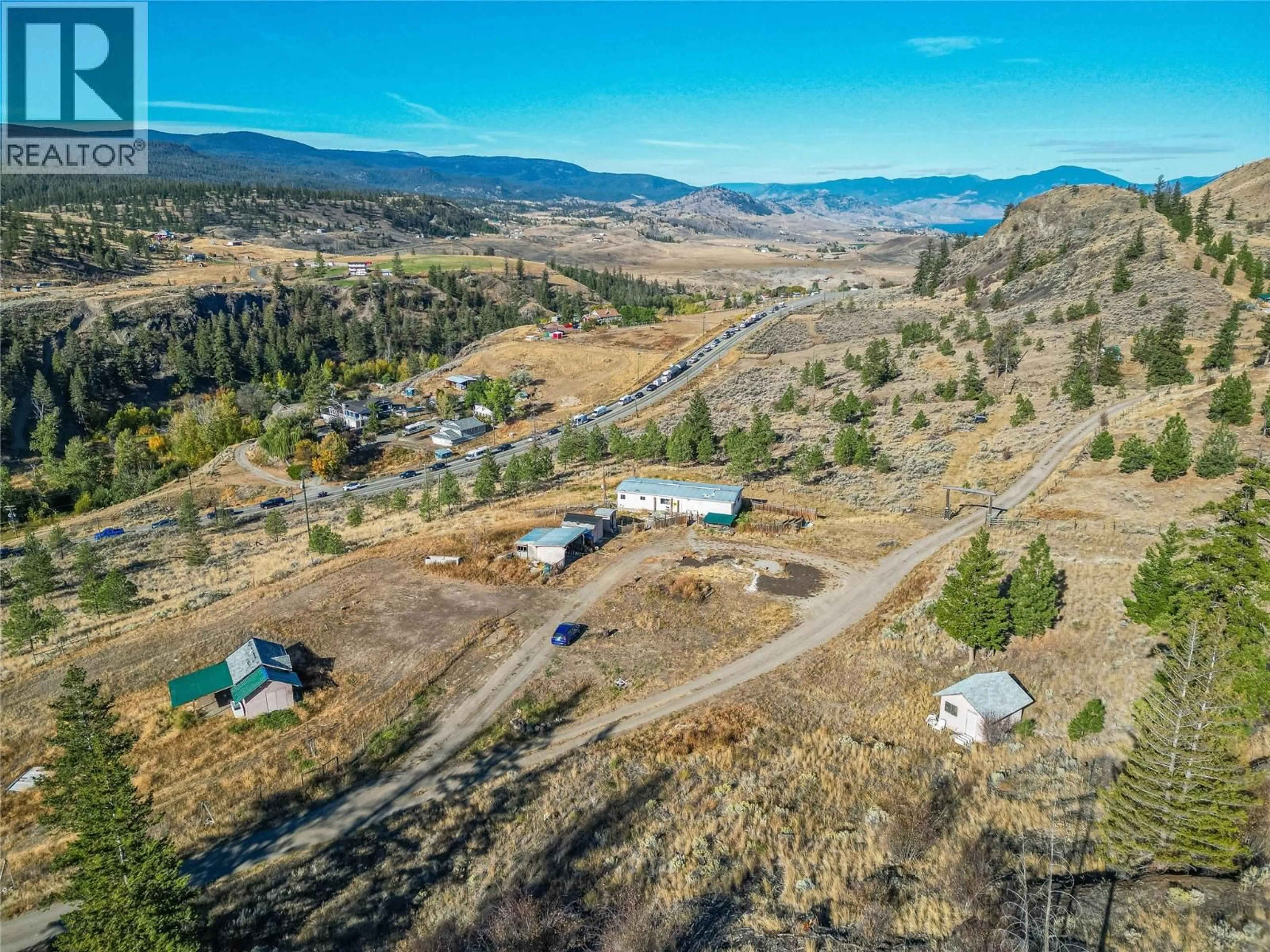 A pic from outside/outdoor area/front of a property/back of a property/a pic from drone, mountain view for 5165 TRANS CANADA HIGHWAY WEST, Kamloops British Columbia V1S2A5