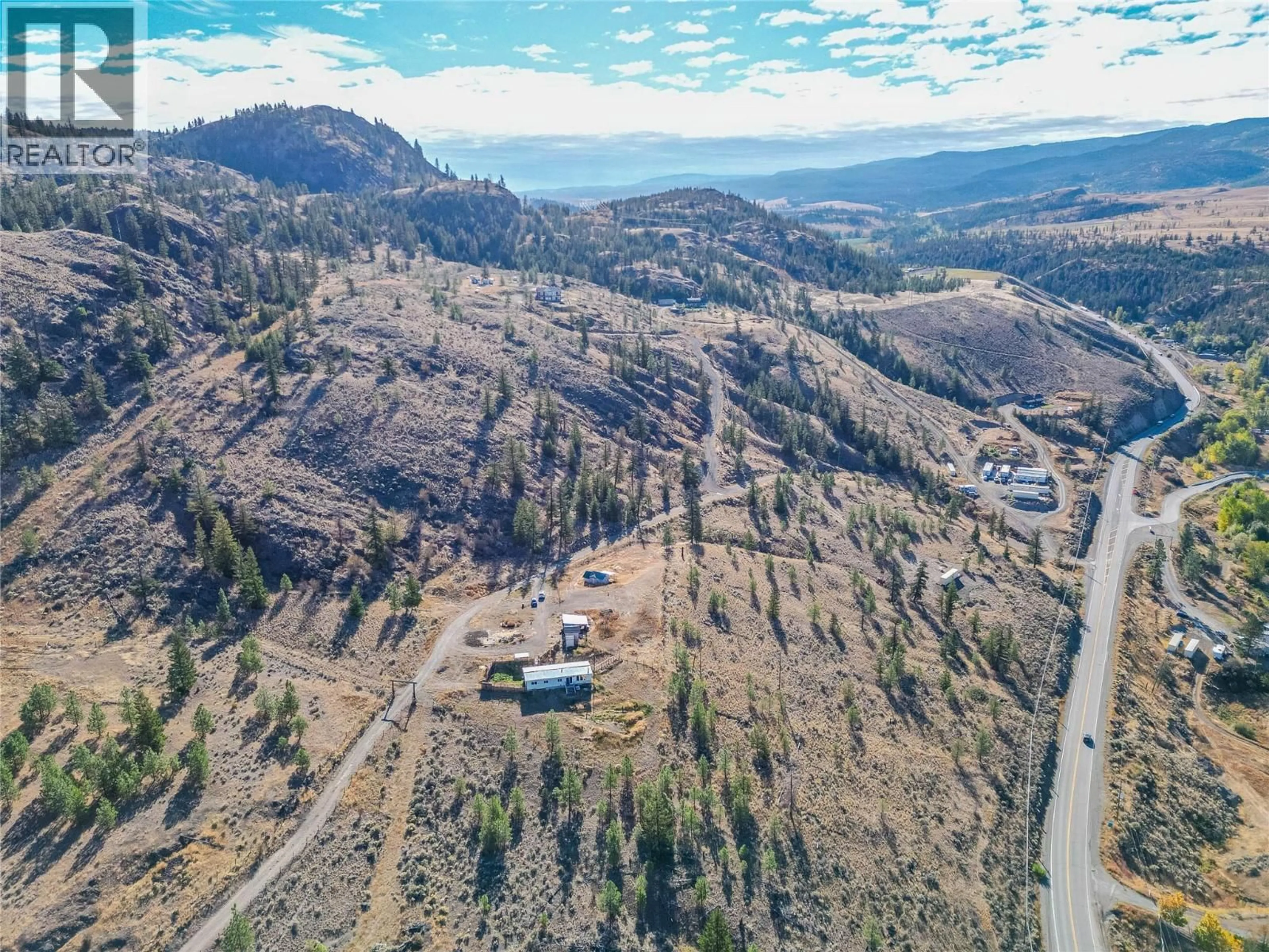 A pic from outside/outdoor area/front of a property/back of a property/a pic from drone, mountain view for 5165 TRANS CANADA HIGHWAY WEST, Kamloops British Columbia V1S2A5
