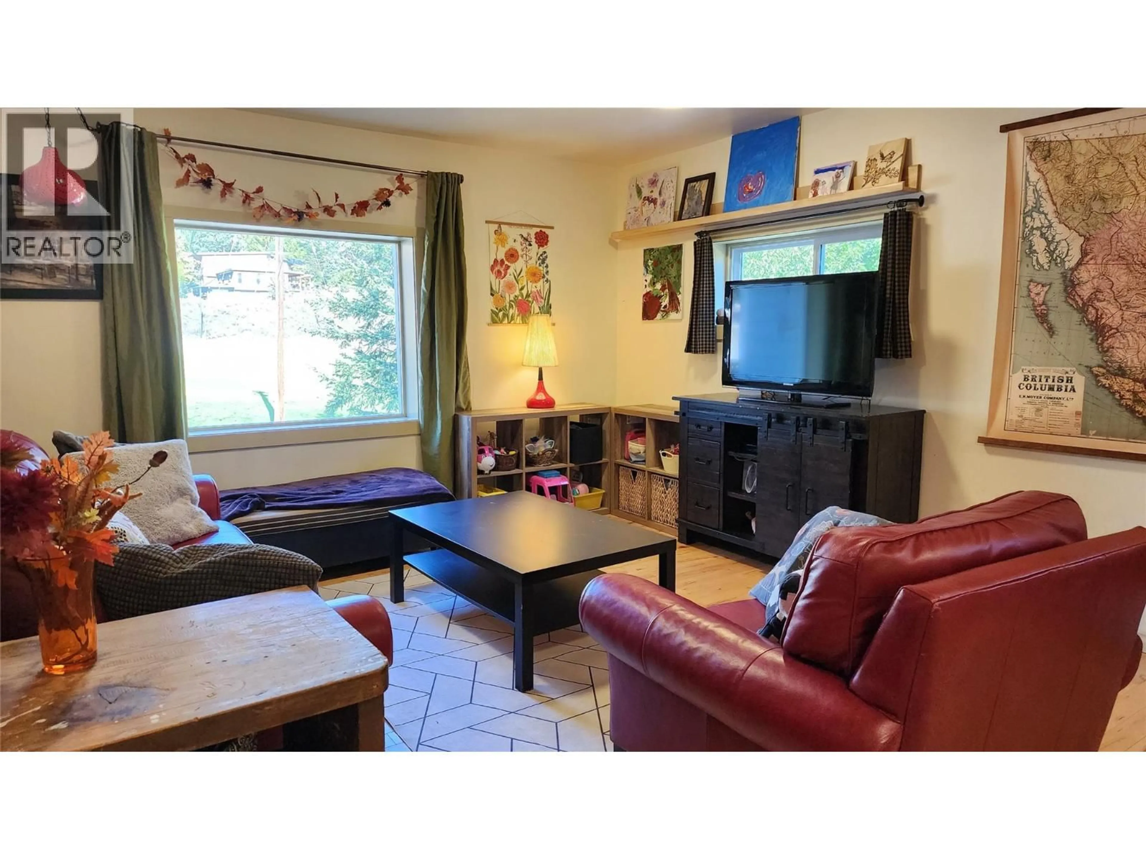 Living room with furniture, unknown for 1731 COOK AVENUE, Rossland British Columbia V0G1Y0