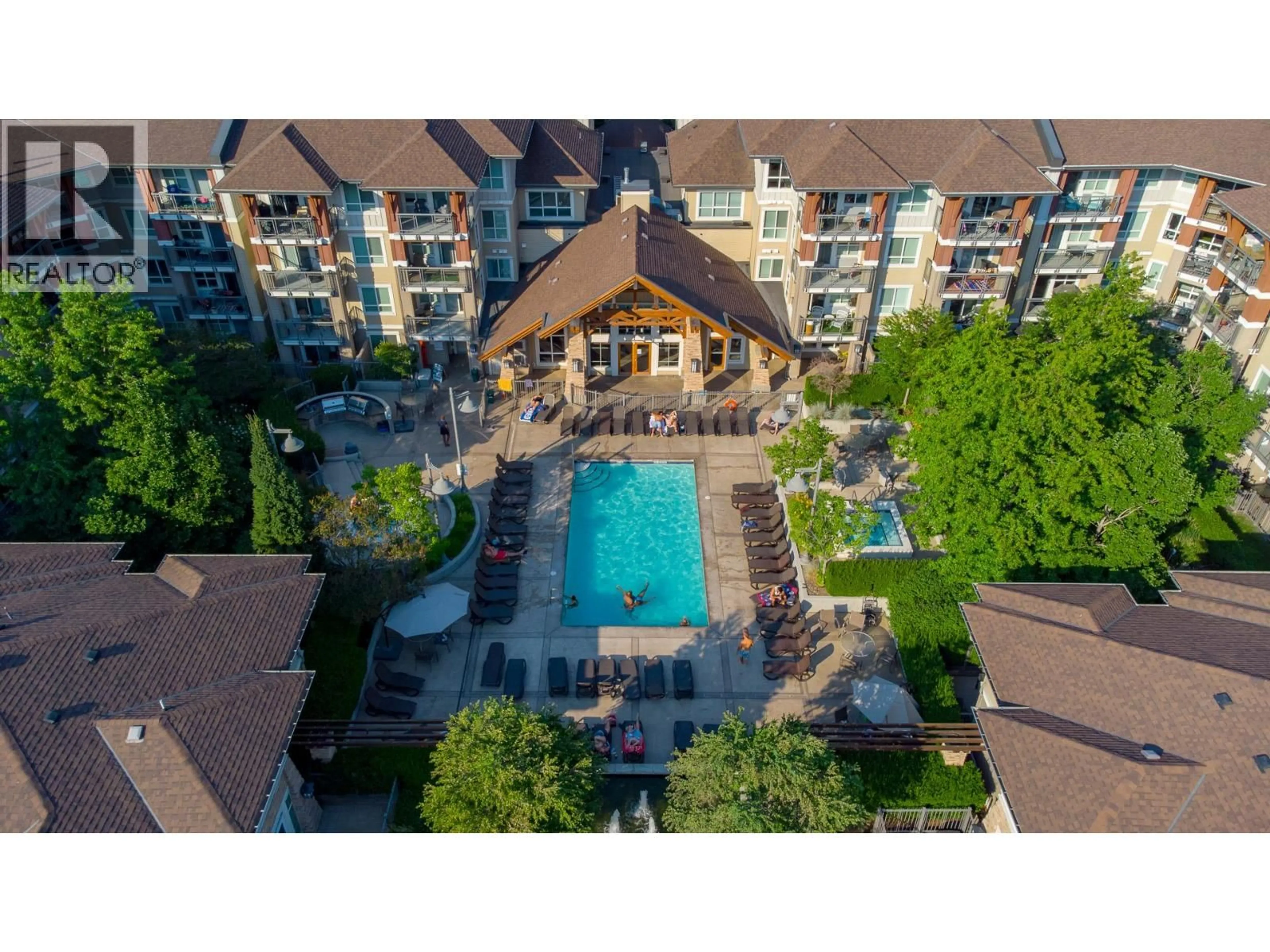 A pic from outside/outdoor area/front of a property/back of a property/a pic from drone, unknown for 120 - 1083 SUNSET DRIVE, Kelowna British Columbia V1Y9Z1