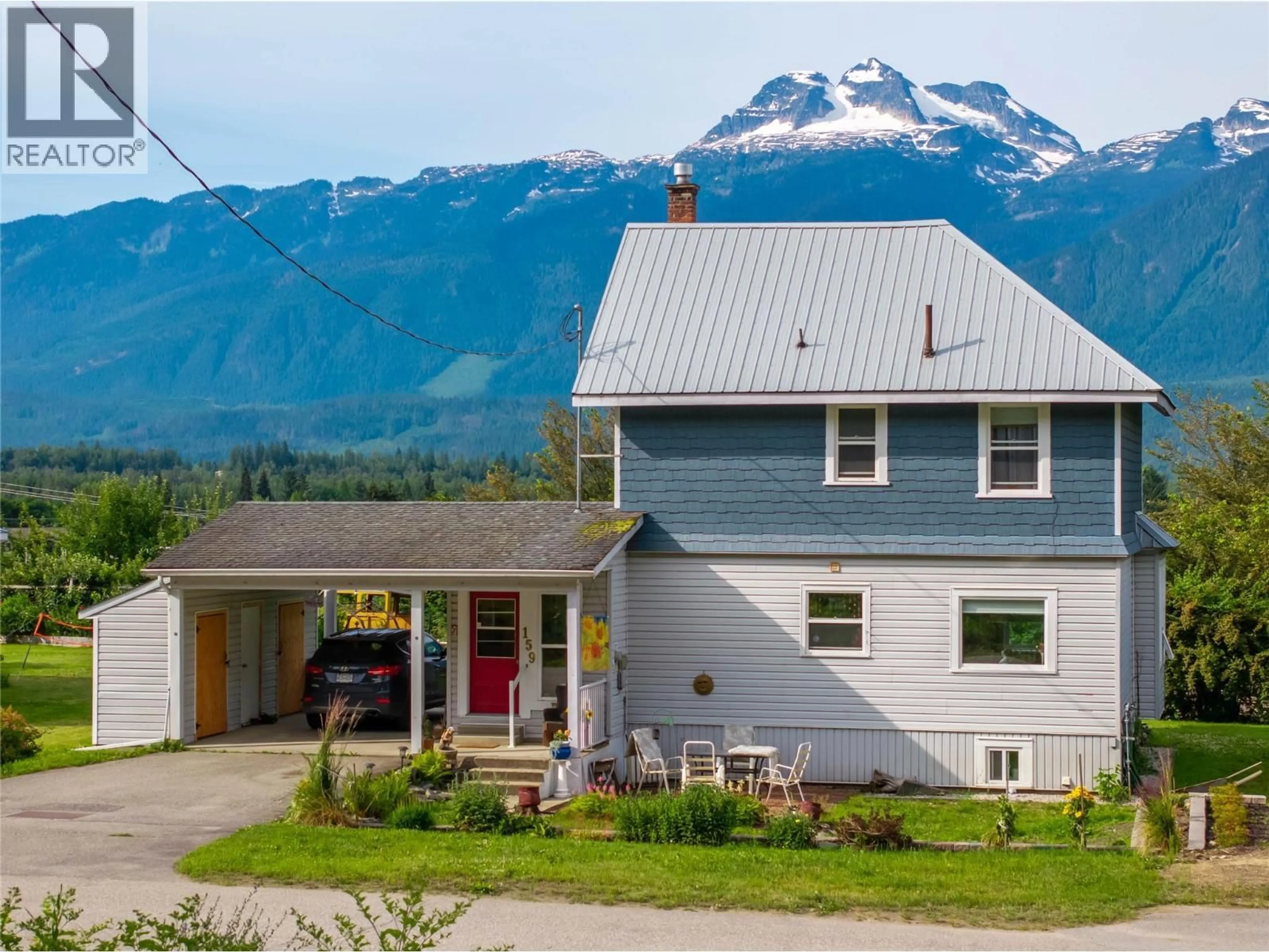A pic from outside/outdoor area/front of a property/back of a property/a pic from drone, mountain view for 159 TRACK STREET EAST, Revelstoke British Columbia V0E2S0