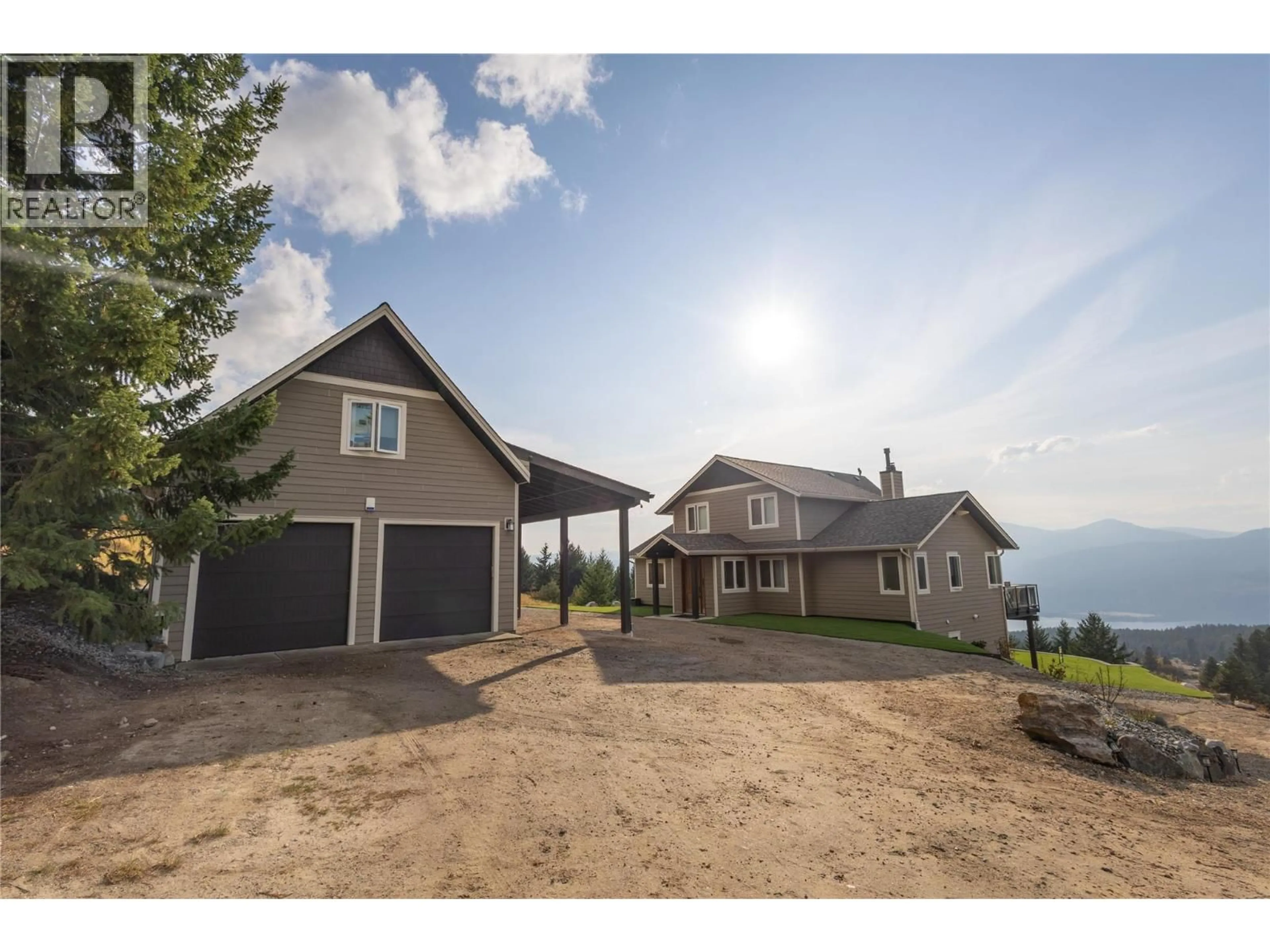 A pic from outside/outdoor area/front of a property/back of a property/a pic from drone, mountain view for 18252 ANGUS ROAD, Lake Country British Columbia V4V1B6