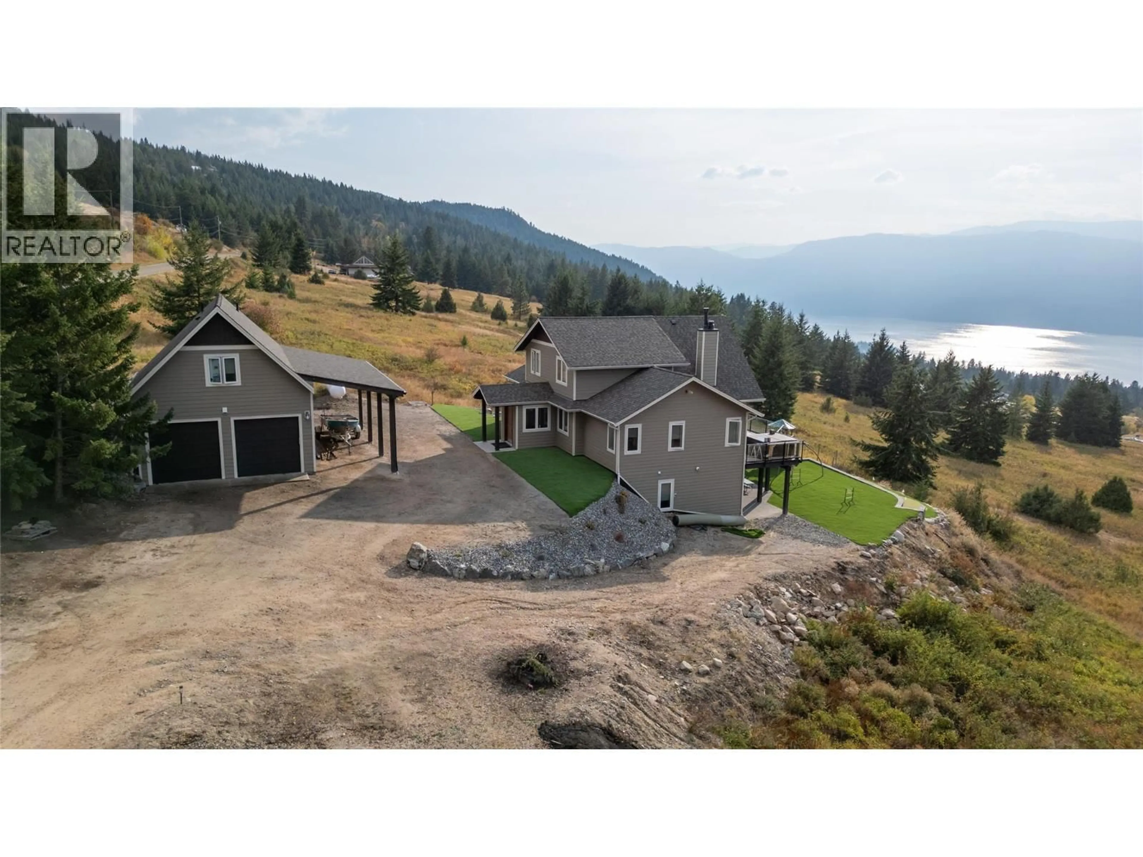 A pic from outside/outdoor area/front of a property/back of a property/a pic from drone, water/lake/river/ocean view for 18252 ANGUS ROAD, Lake Country British Columbia V4V1B6