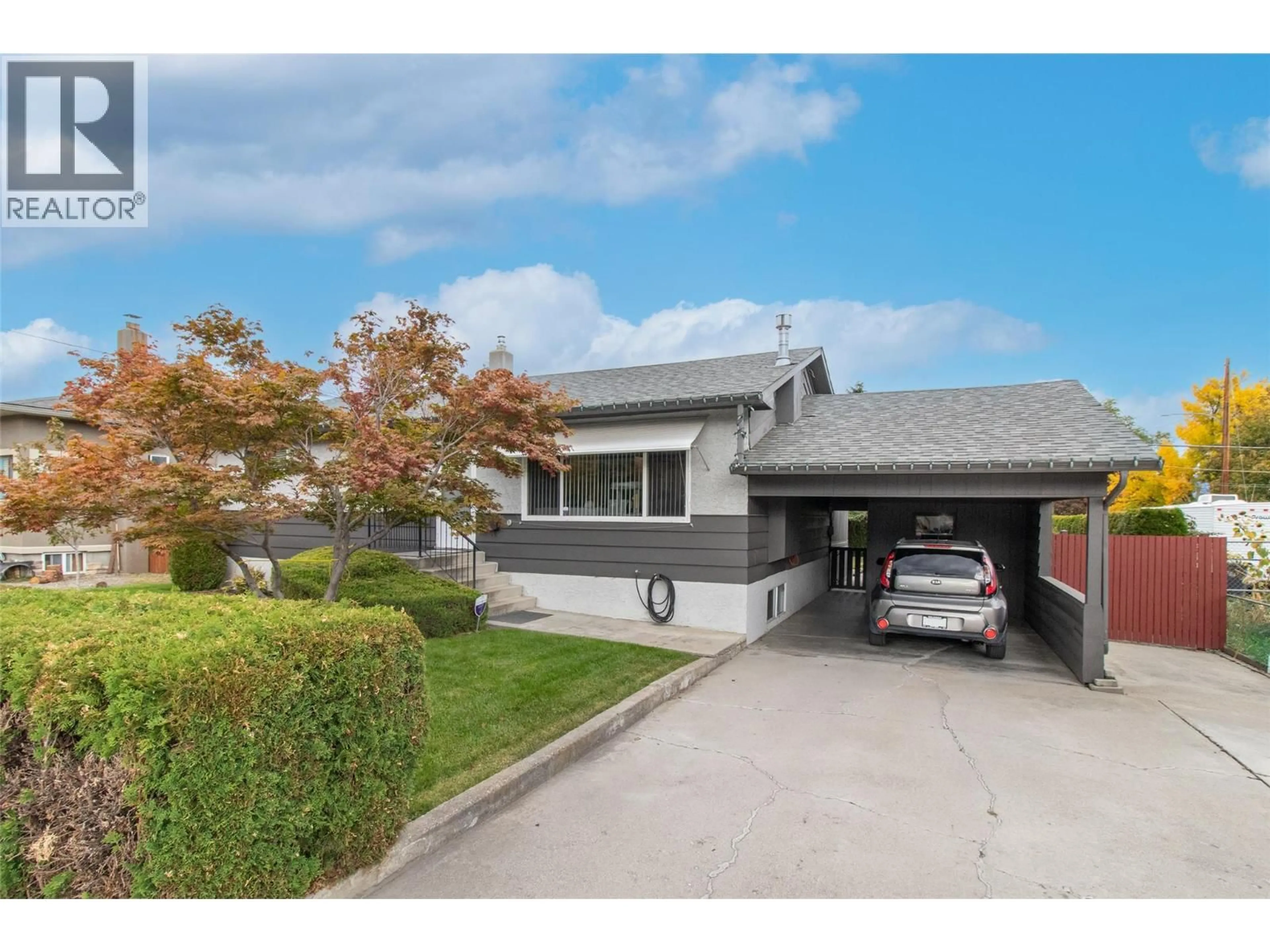 Home with vinyl exterior material, street for 230 PONTO ROAD, Kelowna British Columbia V1X2G1