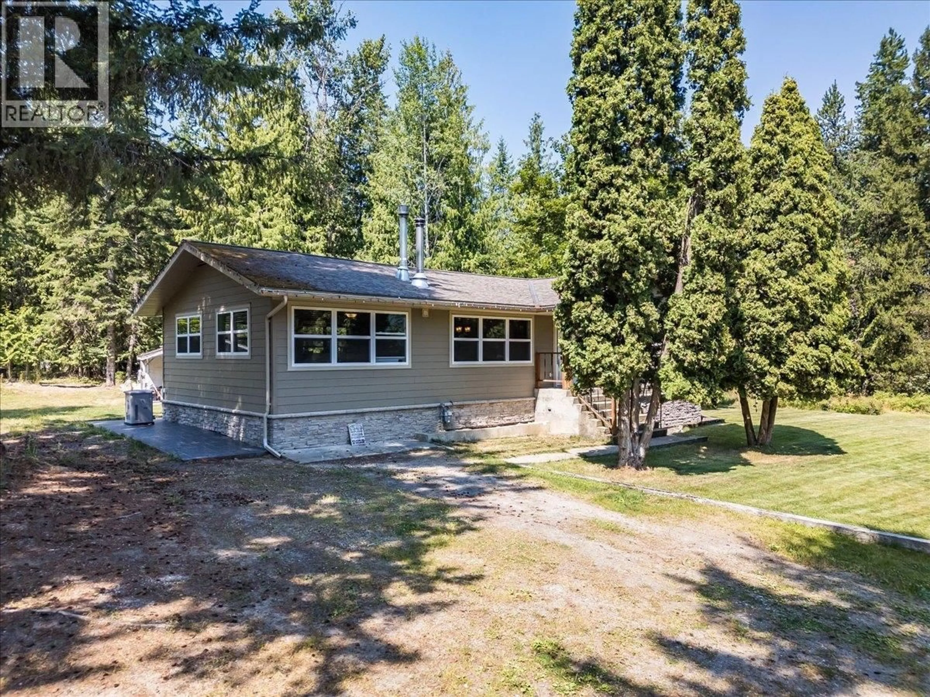 A pic from outside/outdoor area/front of a property/back of a property/a pic from drone, forest/trees view for 6010 HARROP-PROCTER ROAD, Nelson British Columbia V1L6P7