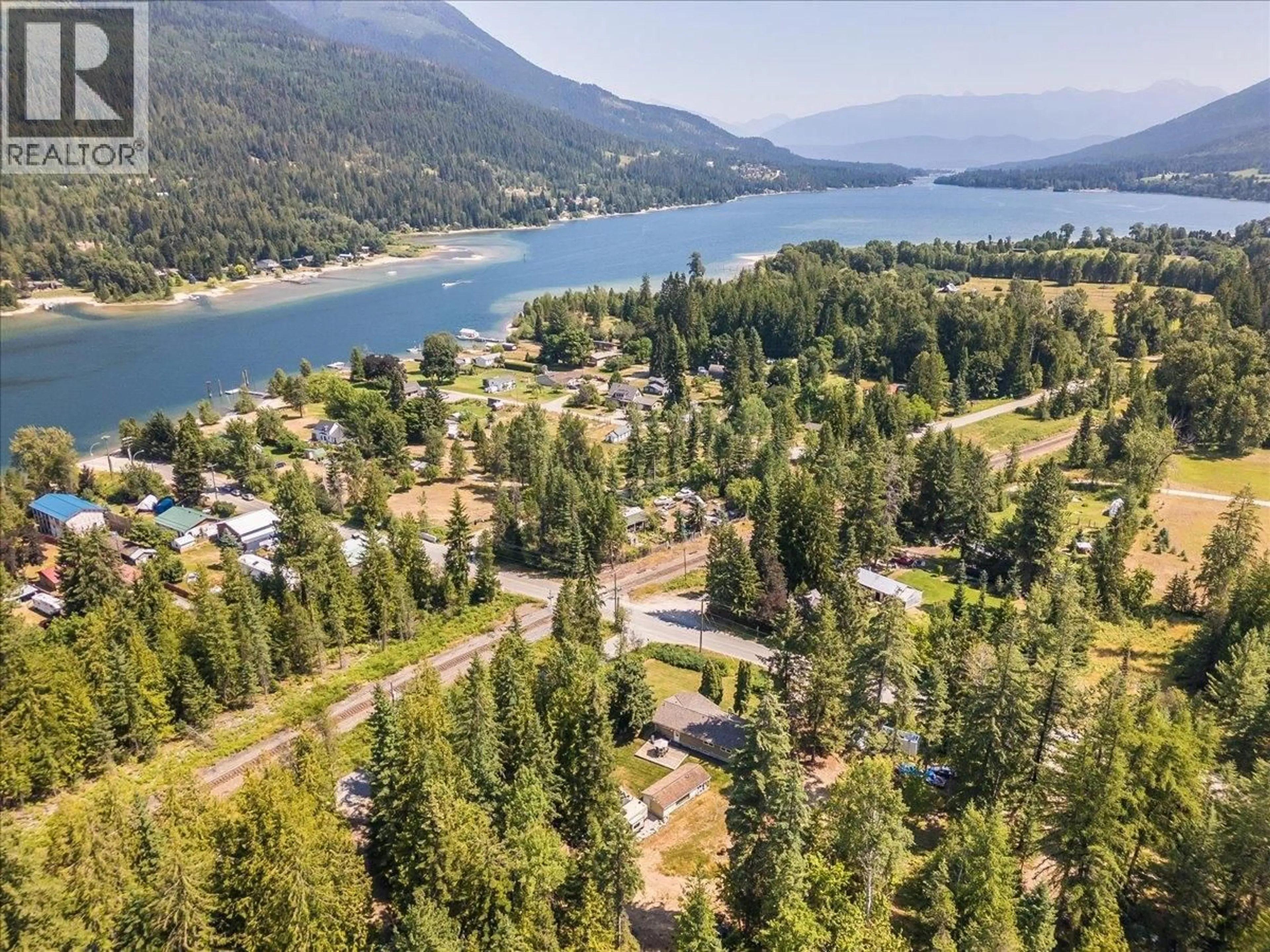 A pic from outside/outdoor area/front of a property/back of a property/a pic from drone, water/lake/river/ocean view for 6010 HARROP-PROCTER ROAD, Nelson British Columbia V1L6P7