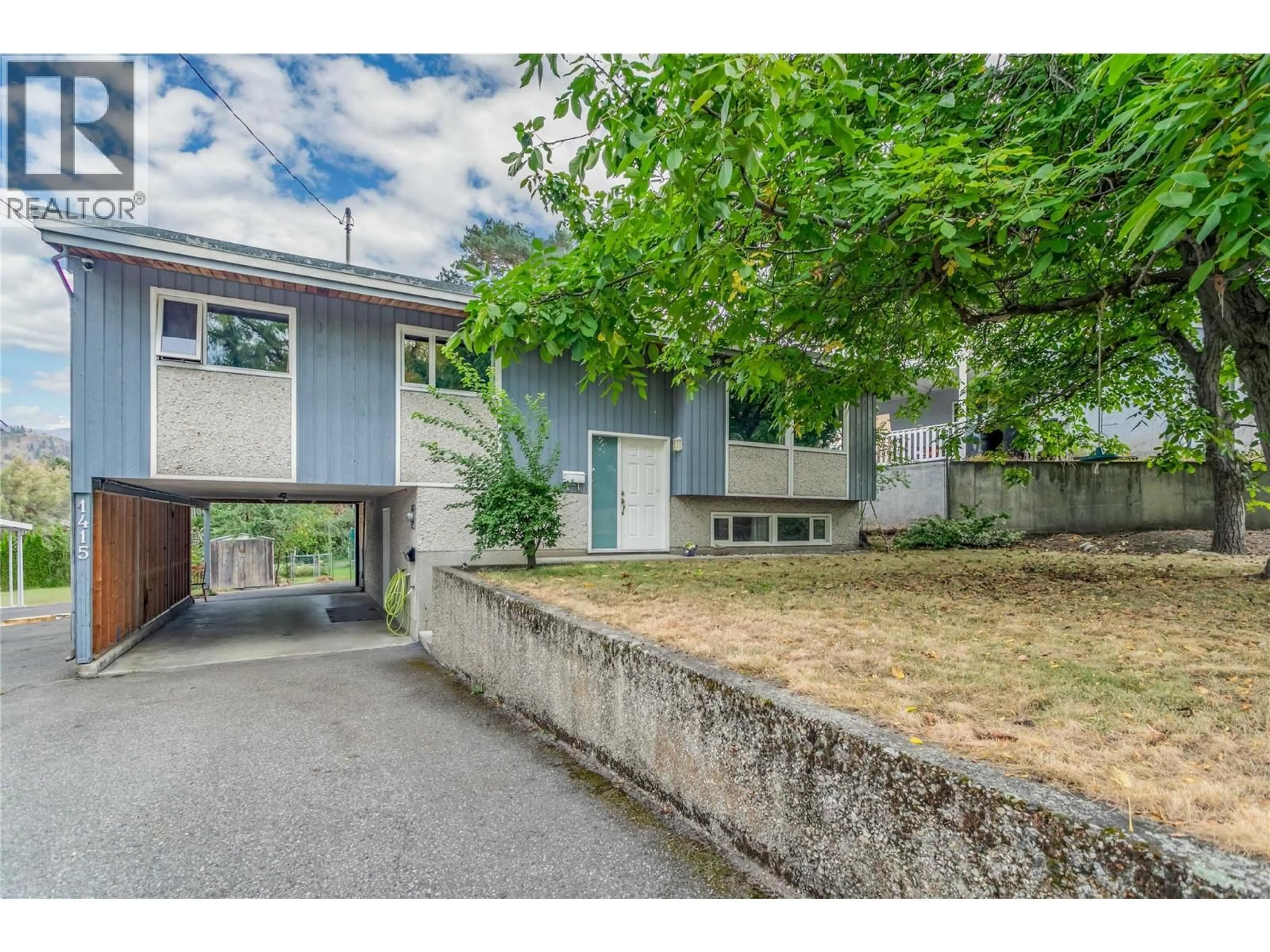 A pic from outside/outdoor area/front of a property/back of a property/a pic from drone, street for 1415 HIGHLAND DRIVE SOUTH, Kelowna British Columbia V1Y3W3