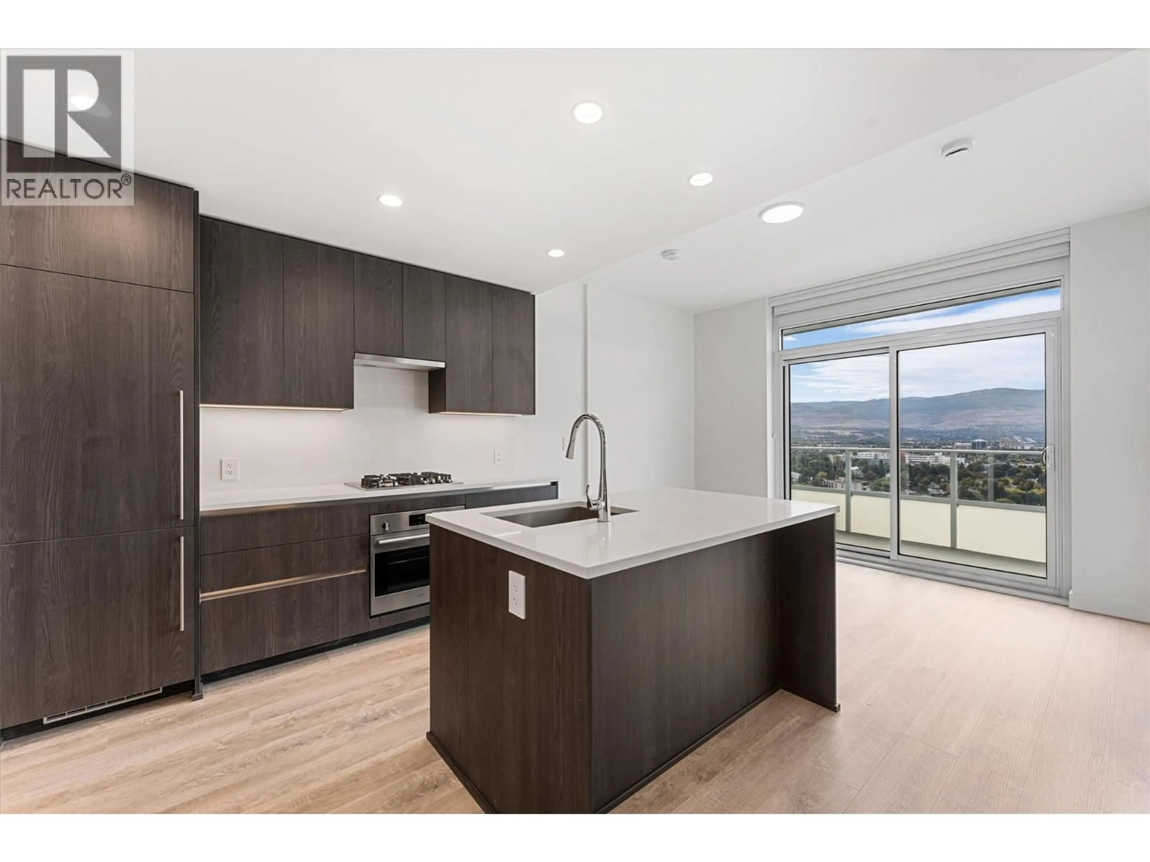 Open concept kitchen, wood/laminate floor for 2205 - 1626 WATER STREET, Kelowna British Columbia V1Y0N7