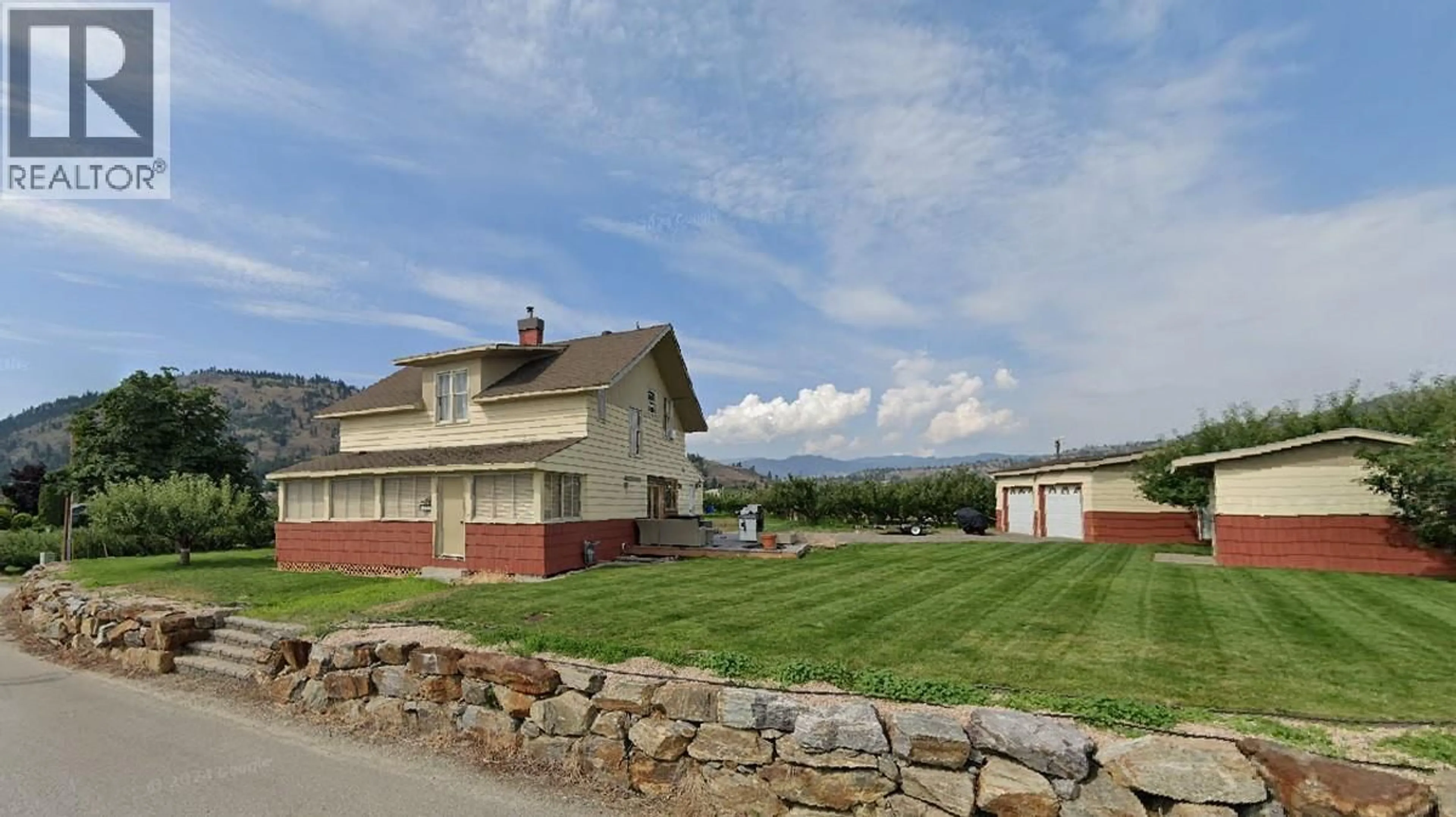 A pic from outside/outdoor area/front of a property/back of a property/a pic from drone, unknown for 13606 COOKE AVENUE, Summerland British Columbia V0H1Z1