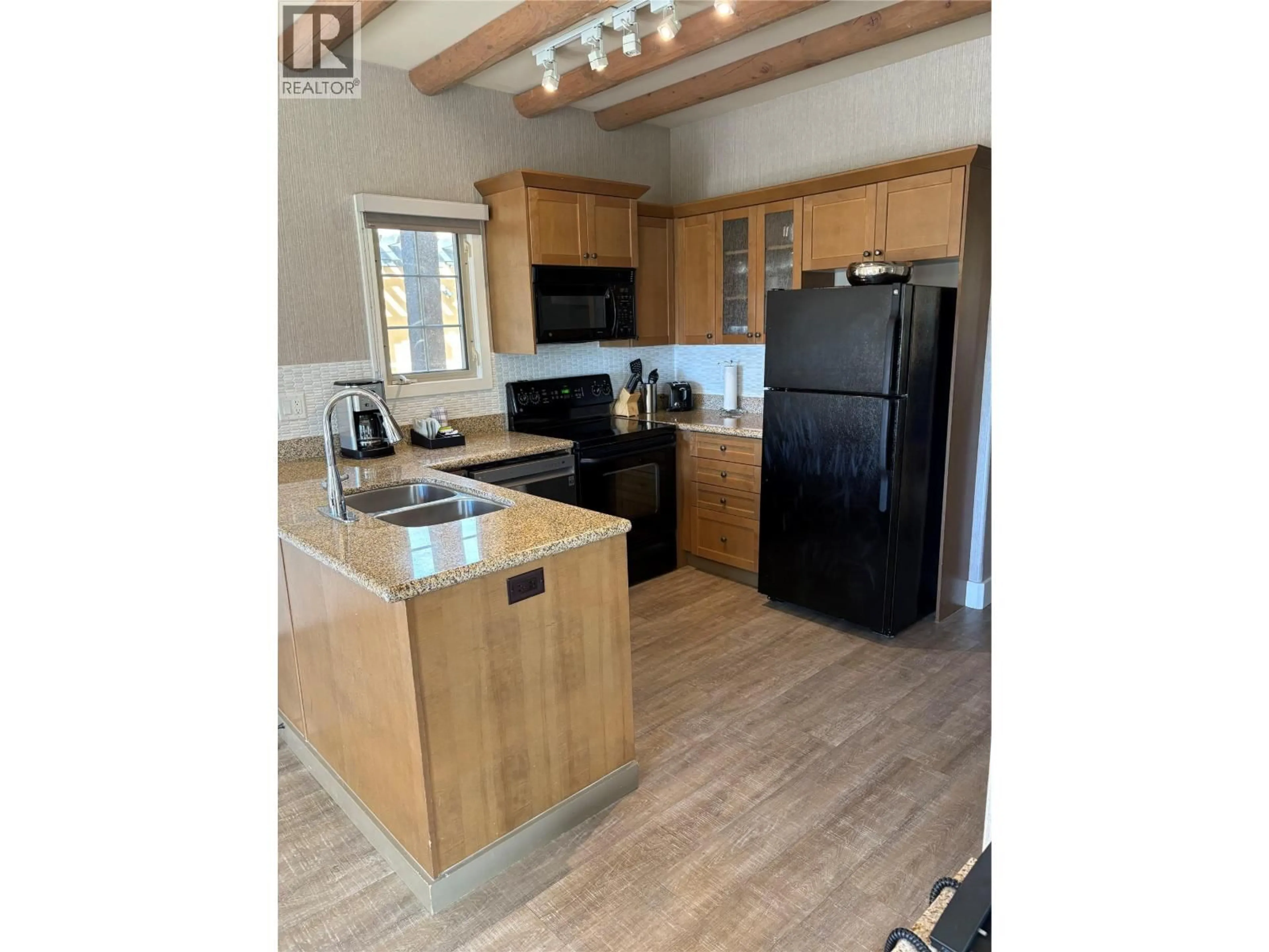 Open concept kitchen, wood/laminate floor for 10 - 1200 RANCHER CREEK ROAD, Osoyoos British Columbia V0H1V6