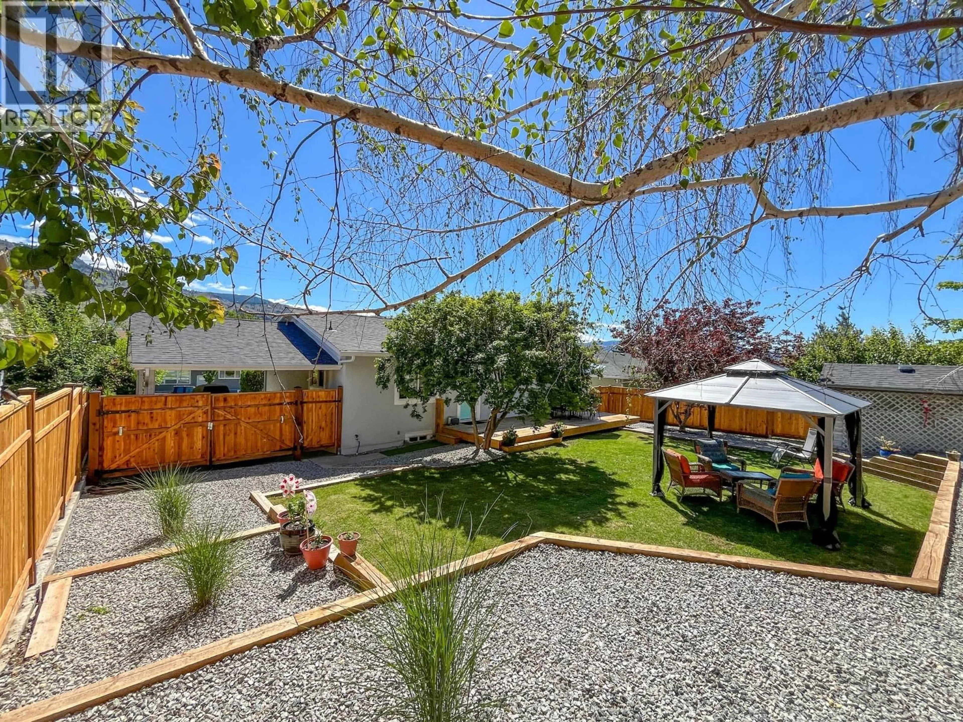 A pic from outside/outdoor area/front of a property/back of a property/a pic from drone, street for 7812 GRAVENSTEIN DRIVE, Osoyoos British Columbia V0H1V0
