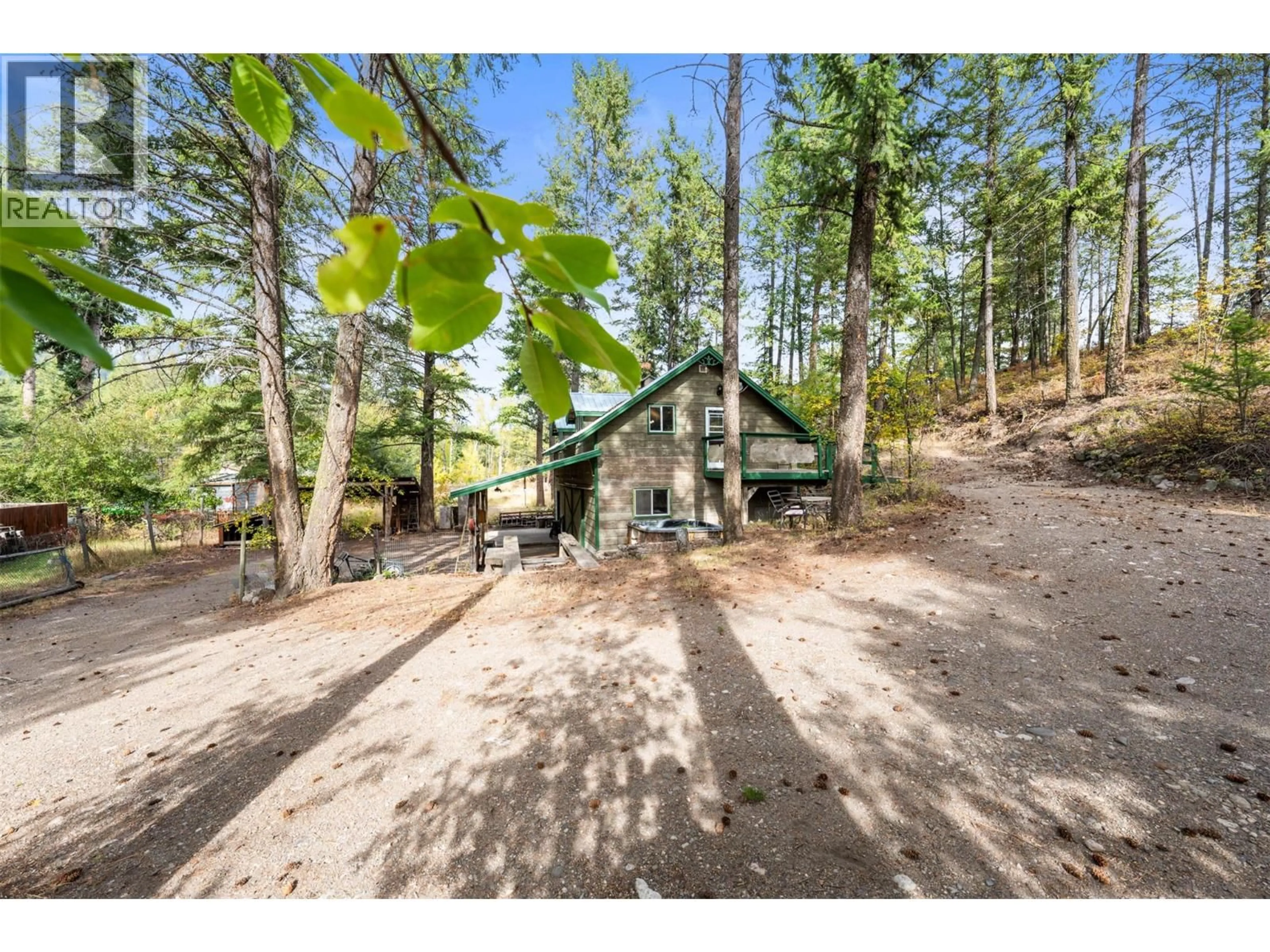 A pic from outside/outdoor area/front of a property/back of a property/a pic from drone, forest/trees view for 860 BALSAM ROAD, Kelowna British Columbia V1Z3V7