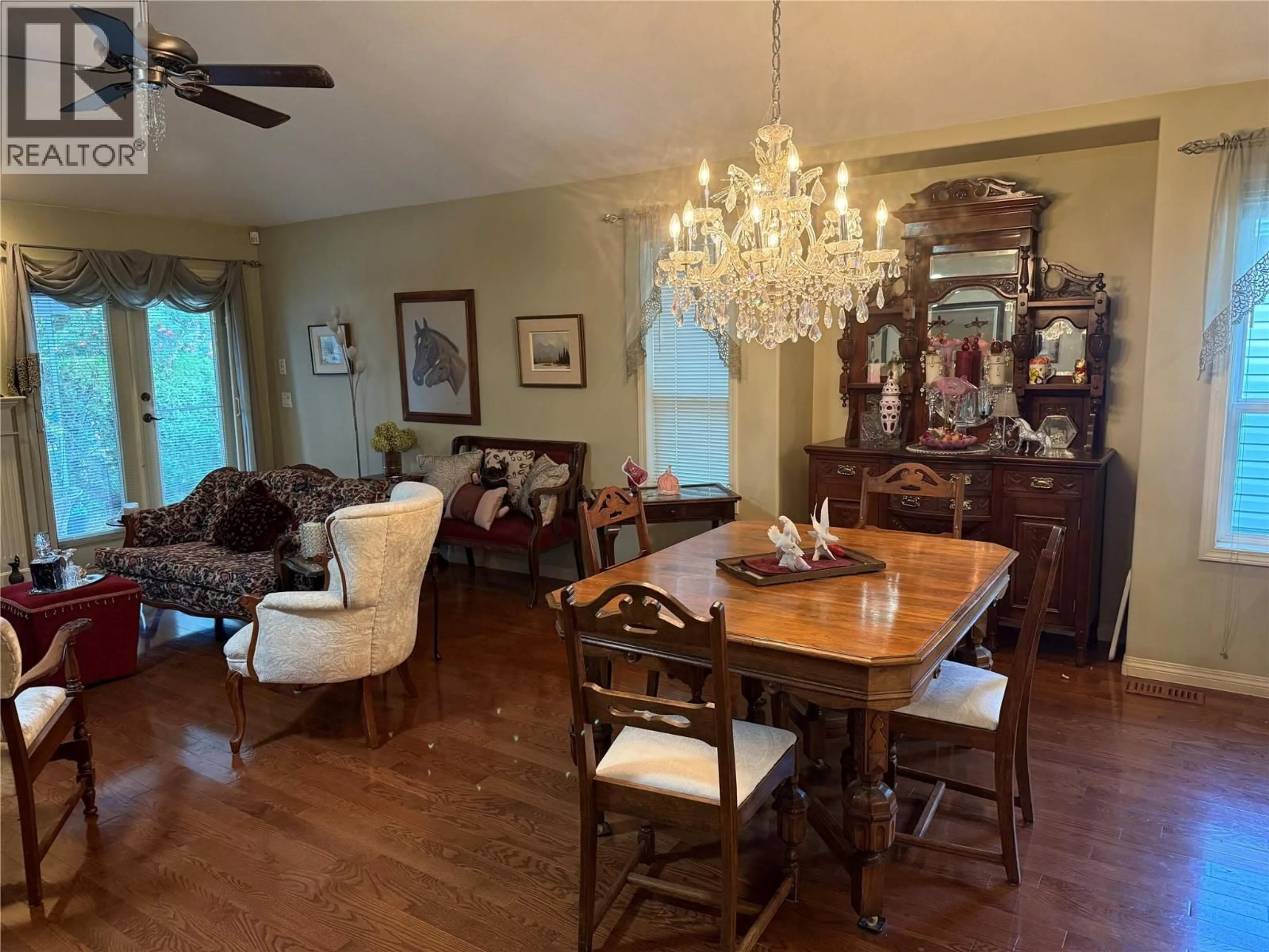 Dining room, wood/laminate floor for 114 - 1188 HOUGHTON ROAD, Kelowna British Columbia V1X2C9