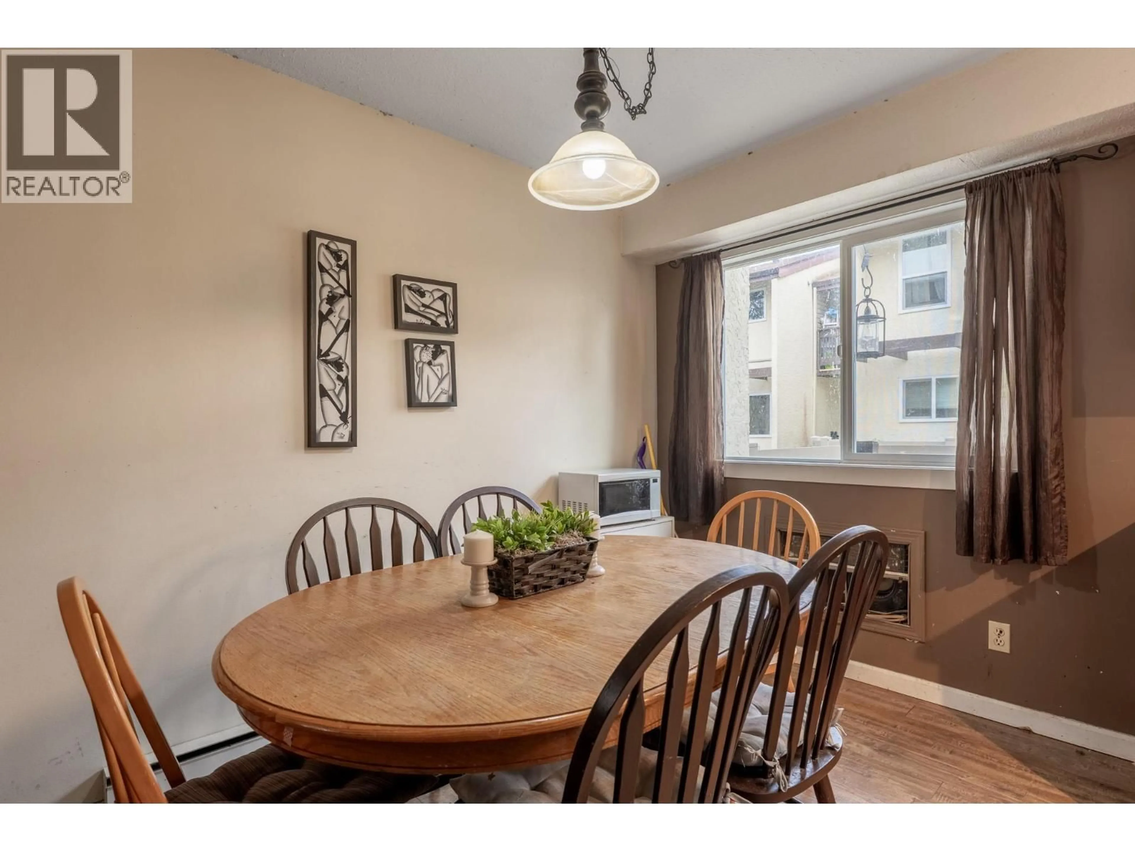 Dining room, wood/laminate floor for 119 - 250 BRIARWOOD ROAD, Kelowna British Columbia V1X2G3