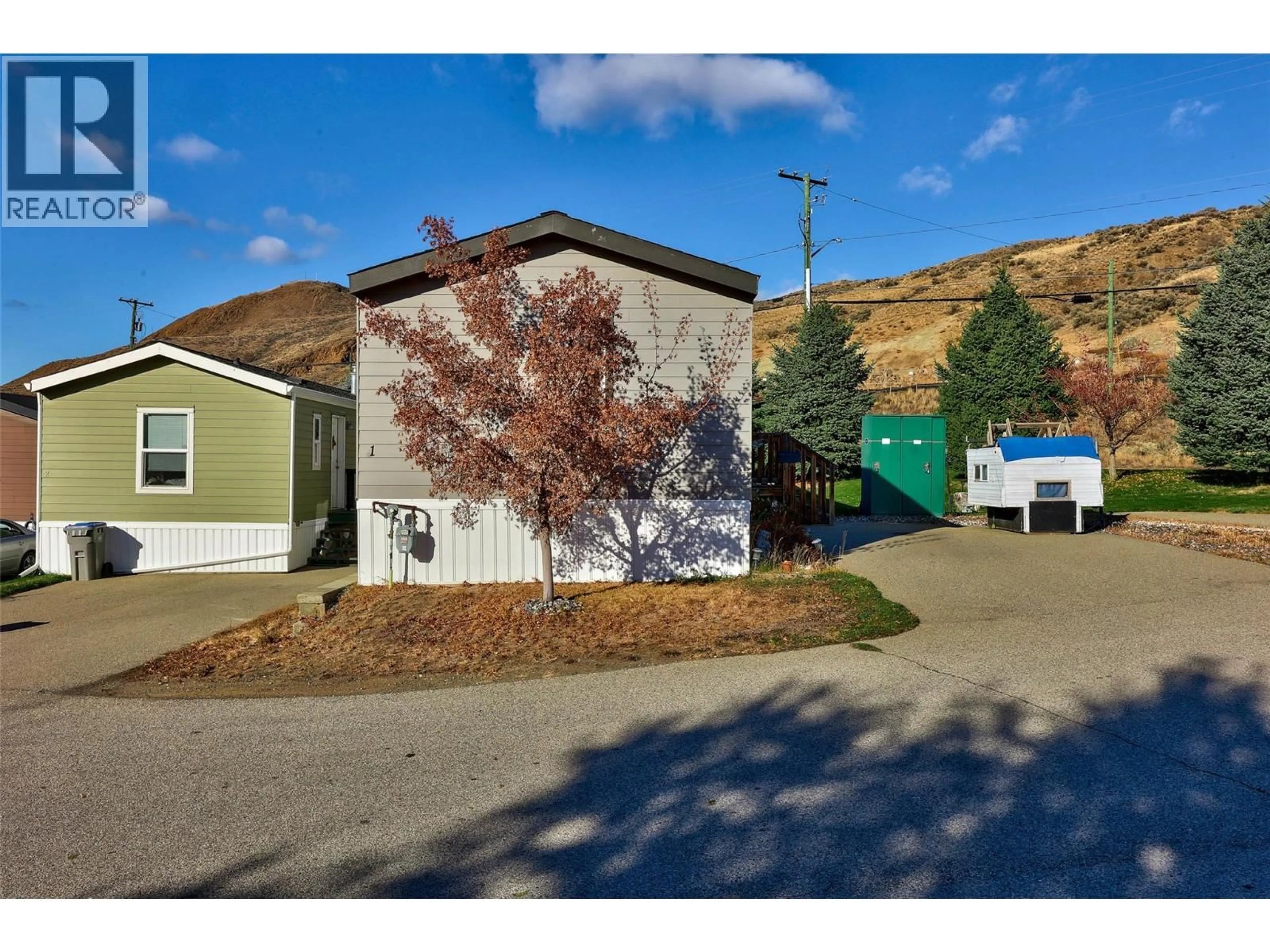 A pic from outside/outdoor area/front of a property/back of a property/a pic from drone, street for 1-1781 - 1781 ORD ROAD, Kamloops British Columbia V2B0E8