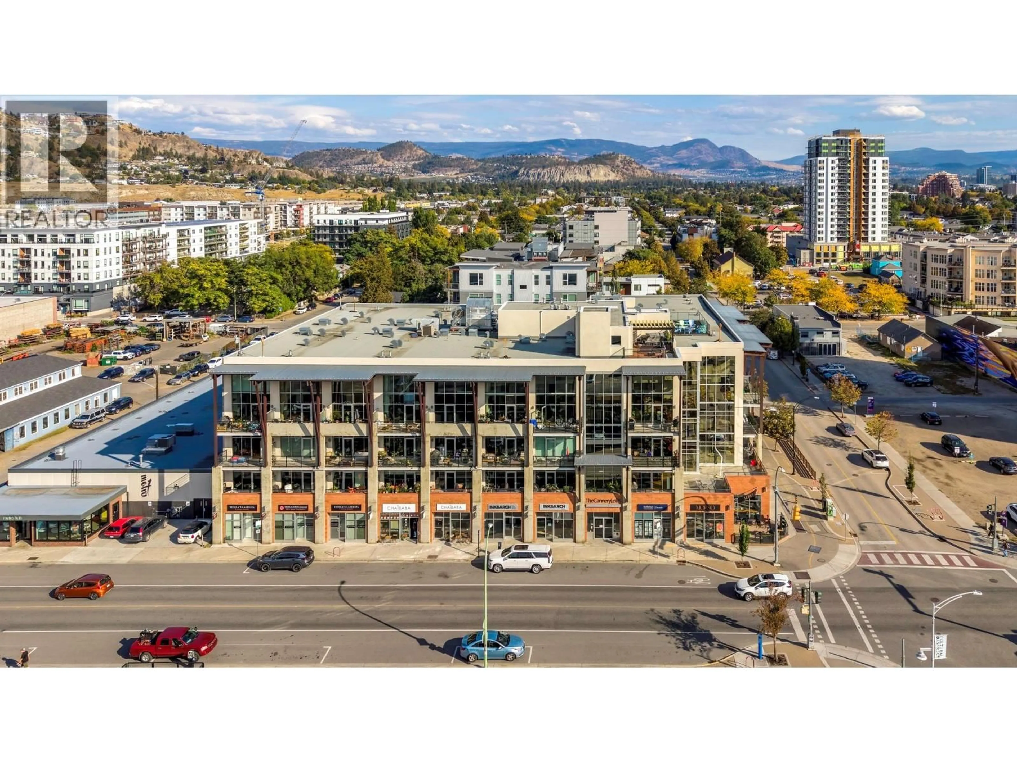 A pic from outside/outdoor area/front of a property/back of a property/a pic from drone, unknown for 212 - 1289 ELLIS STREET, Kelowna British Columbia V1Y9X6