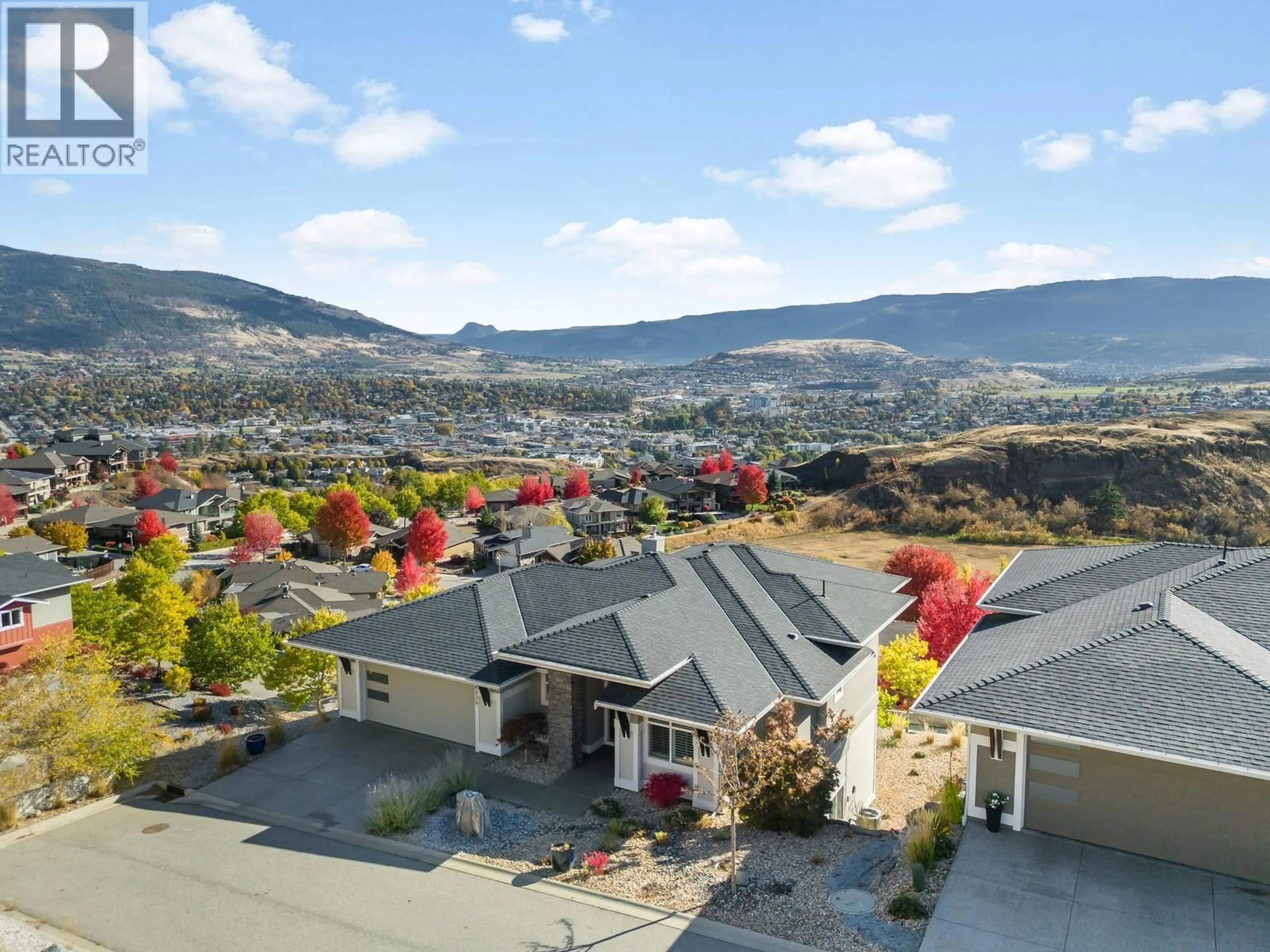 A pic from outside/outdoor area/front of a property/back of a property/a pic from drone, mountain view for 5020 PAINTED TURTLE LANE, Vernon British Columbia V1T9Y5