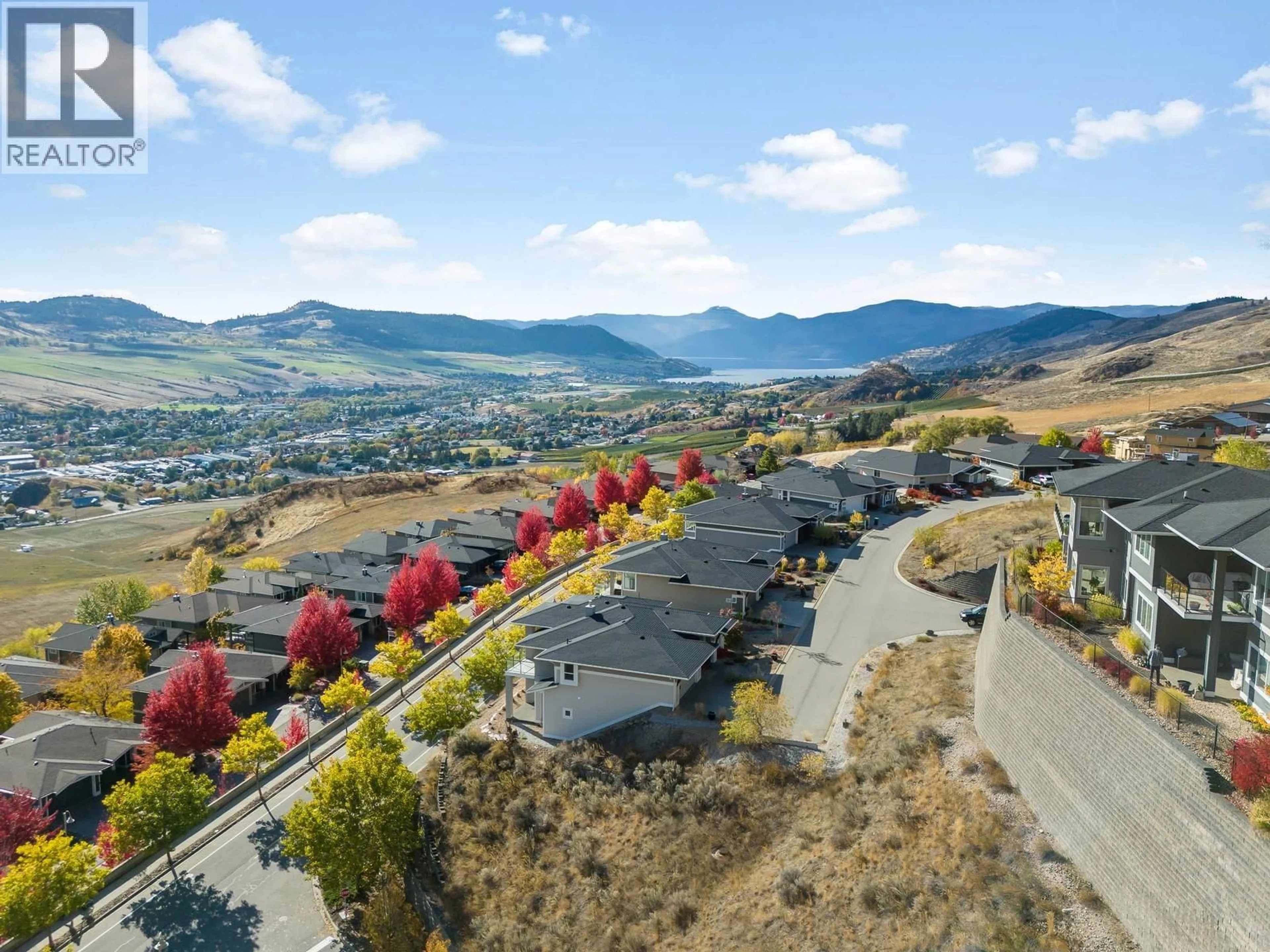 A pic from outside/outdoor area/front of a property/back of a property/a pic from drone, mountain view for 5020 PAINTED TURTLE LANE, Vernon British Columbia V1T9Y5