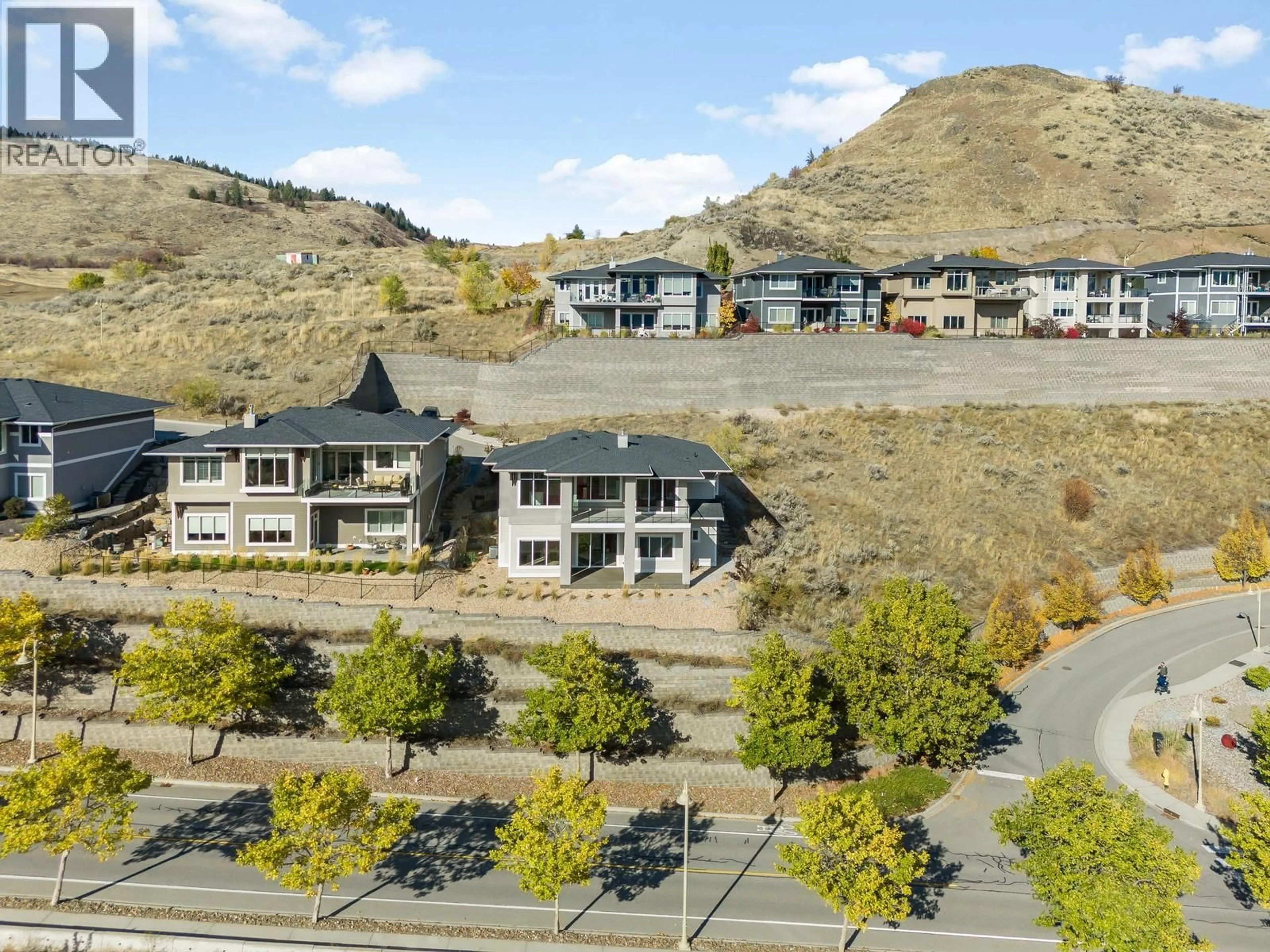 A pic from outside/outdoor area/front of a property/back of a property/a pic from drone, mountain view for 5020 PAINTED TURTLE LANE, Vernon British Columbia V1T9Y5