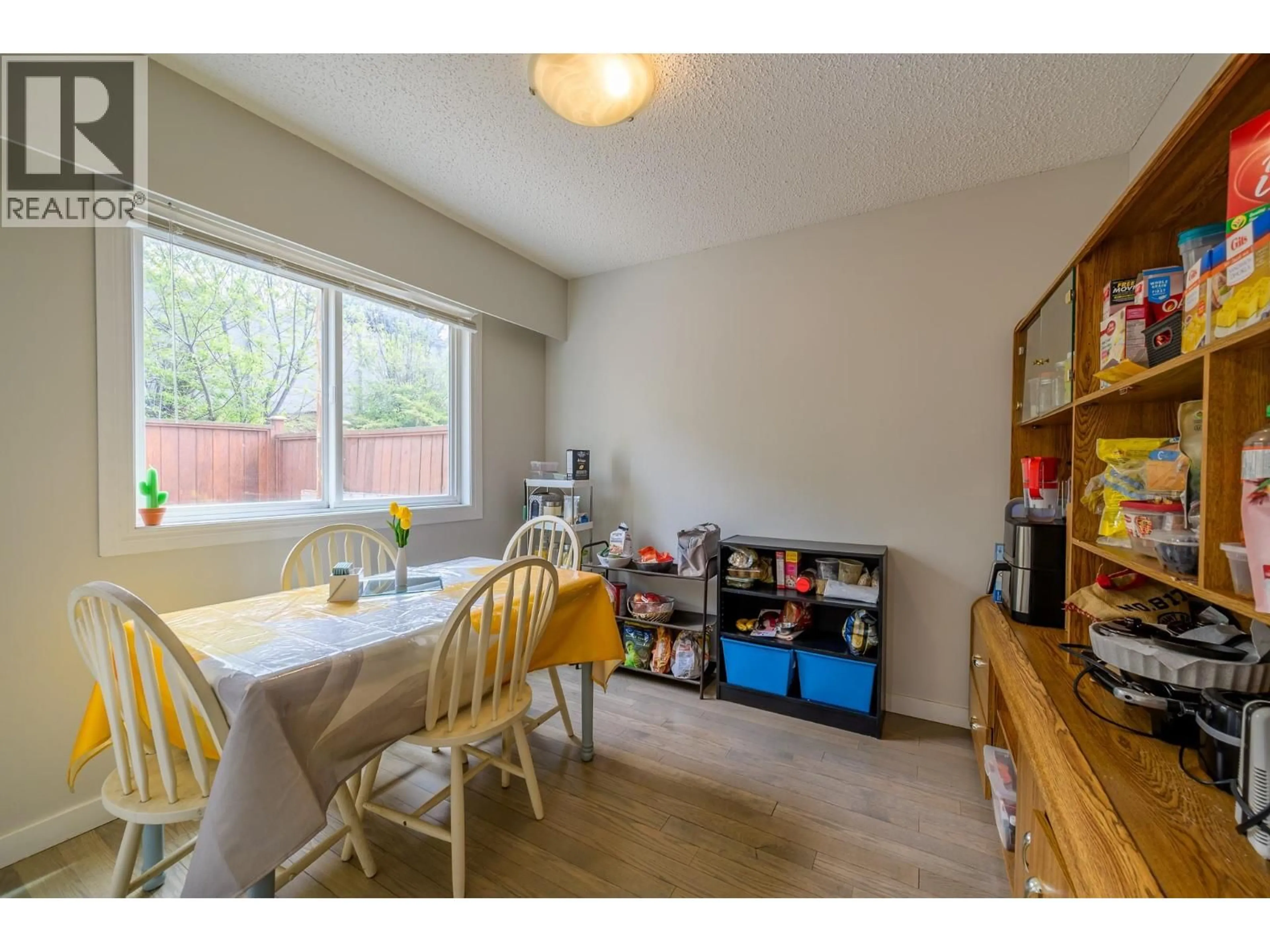 Dining room, wood/laminate floor for 83 - 665 MCBETH PLACE, Kamloops British Columbia V2C5V9