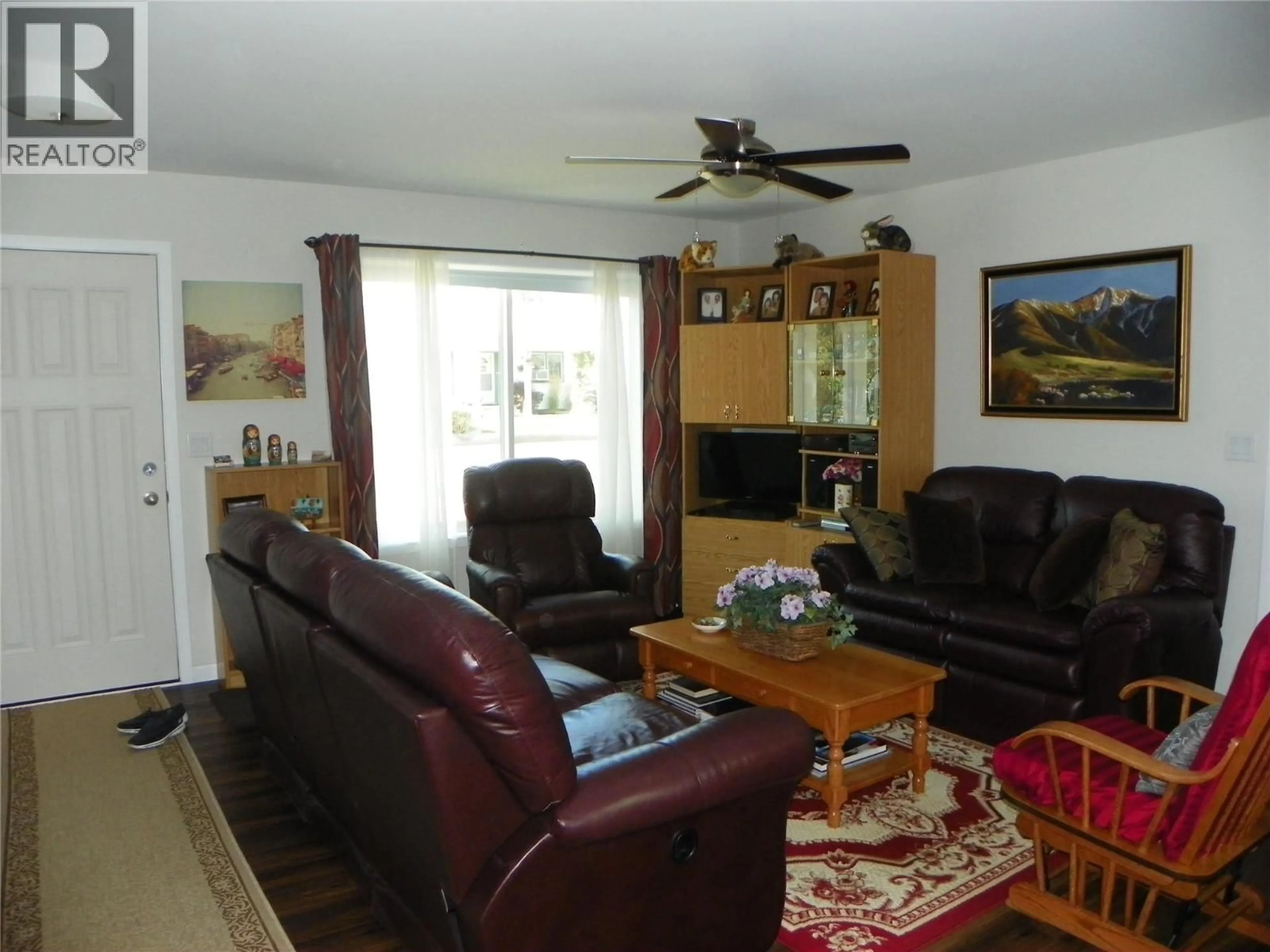 Living room with furniture, wood/laminate floor for 316 FENCHURCH AVENUE, Princeton British Columbia V0X1W0