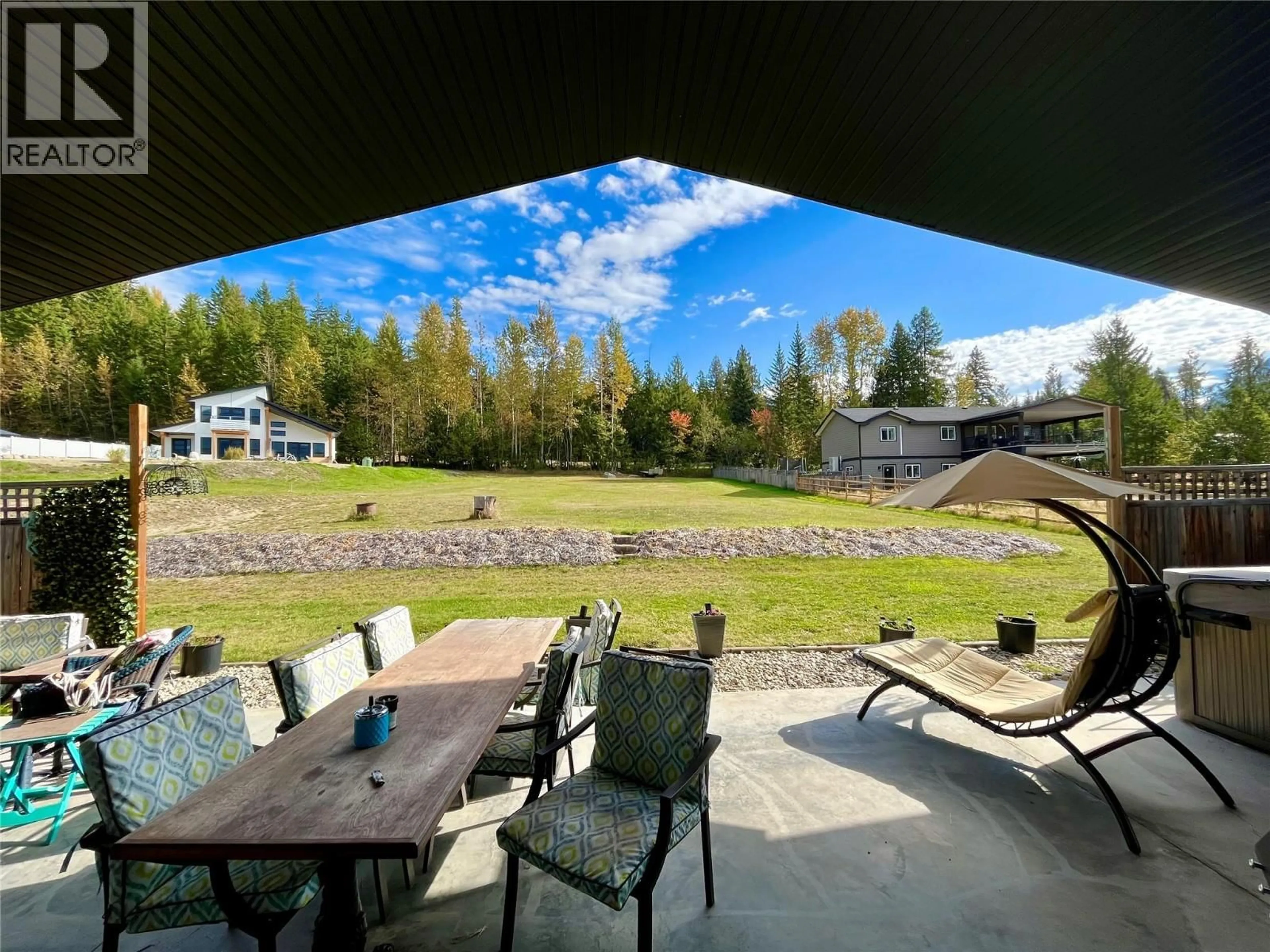 Patio, water/lake/river/ocean view for 207 COTSWOLD ROAD, Nakusp British Columbia V0G1R1