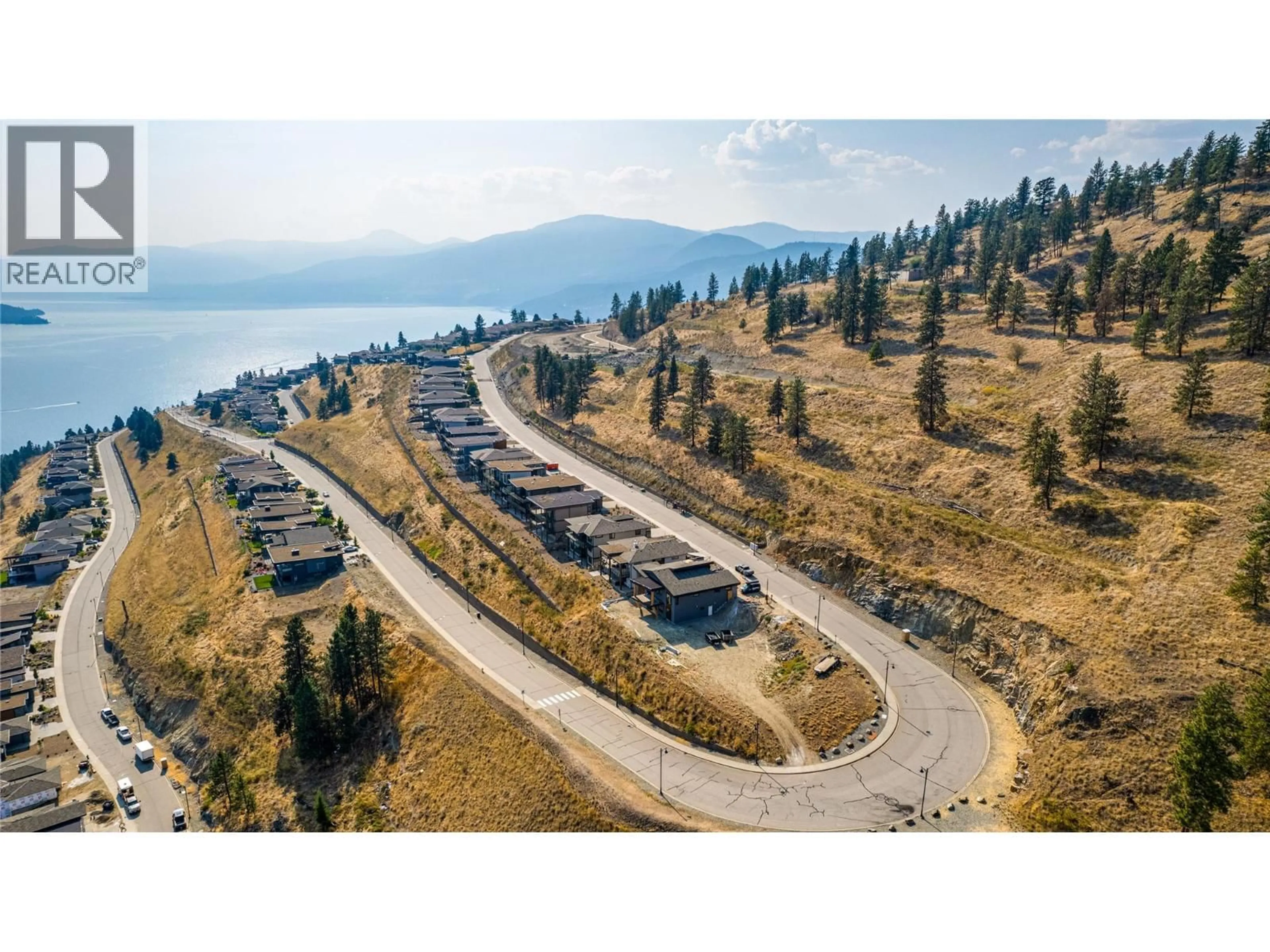 A pic from outside/outdoor area/front of a property/back of a property/a pic from drone, mountain view for 8932 TAVISTOCK ROAD, Vernon British Columbia V1H2L4