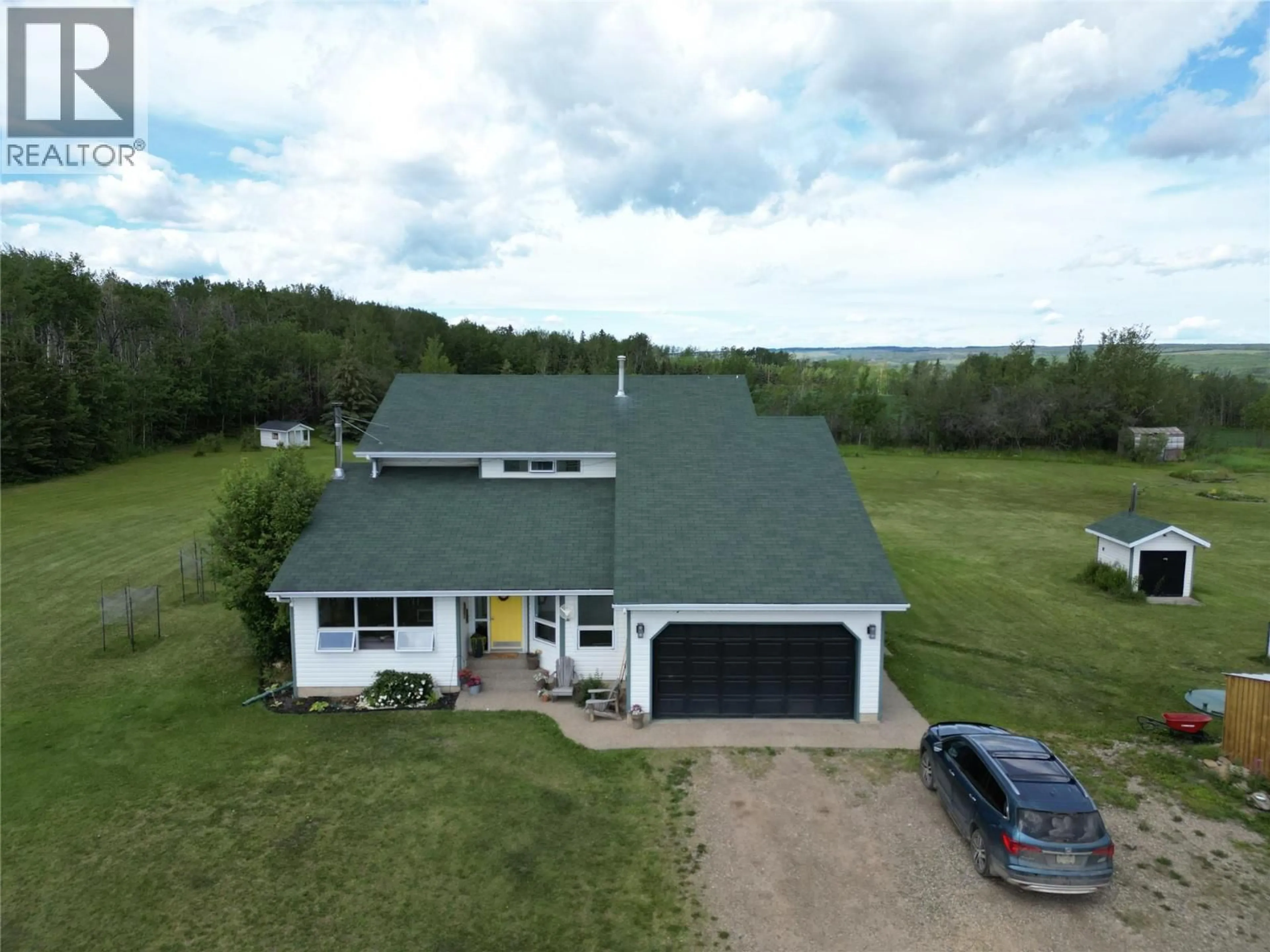A pic from outside/outdoor area/front of a property/back of a property/a pic from drone, building for 3443 210 ROAD, Dawson Creek British Columbia V1G0C2