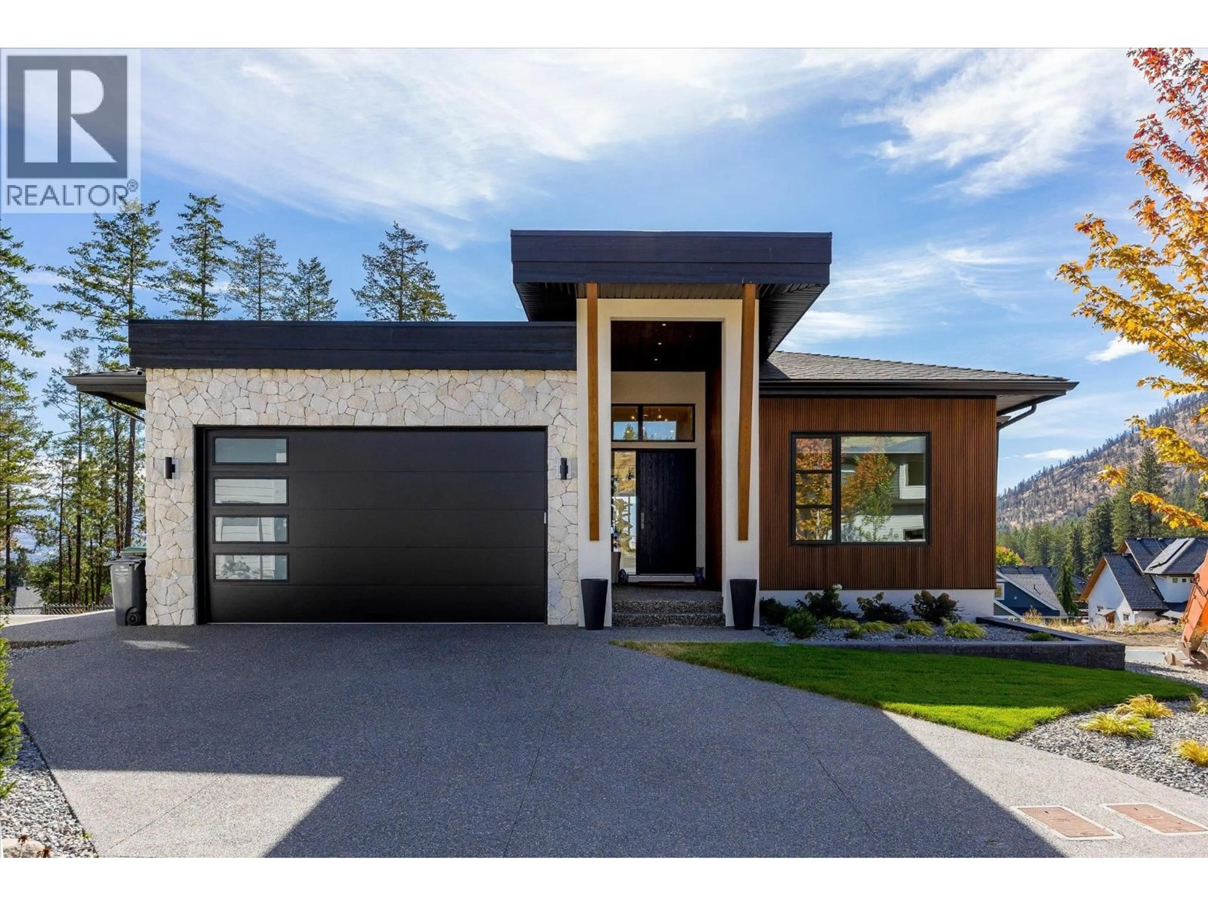 Home with brick exterior material, street for 1395 APRIL SPRINGS COURT, Kelowna British Columbia V1V2C6