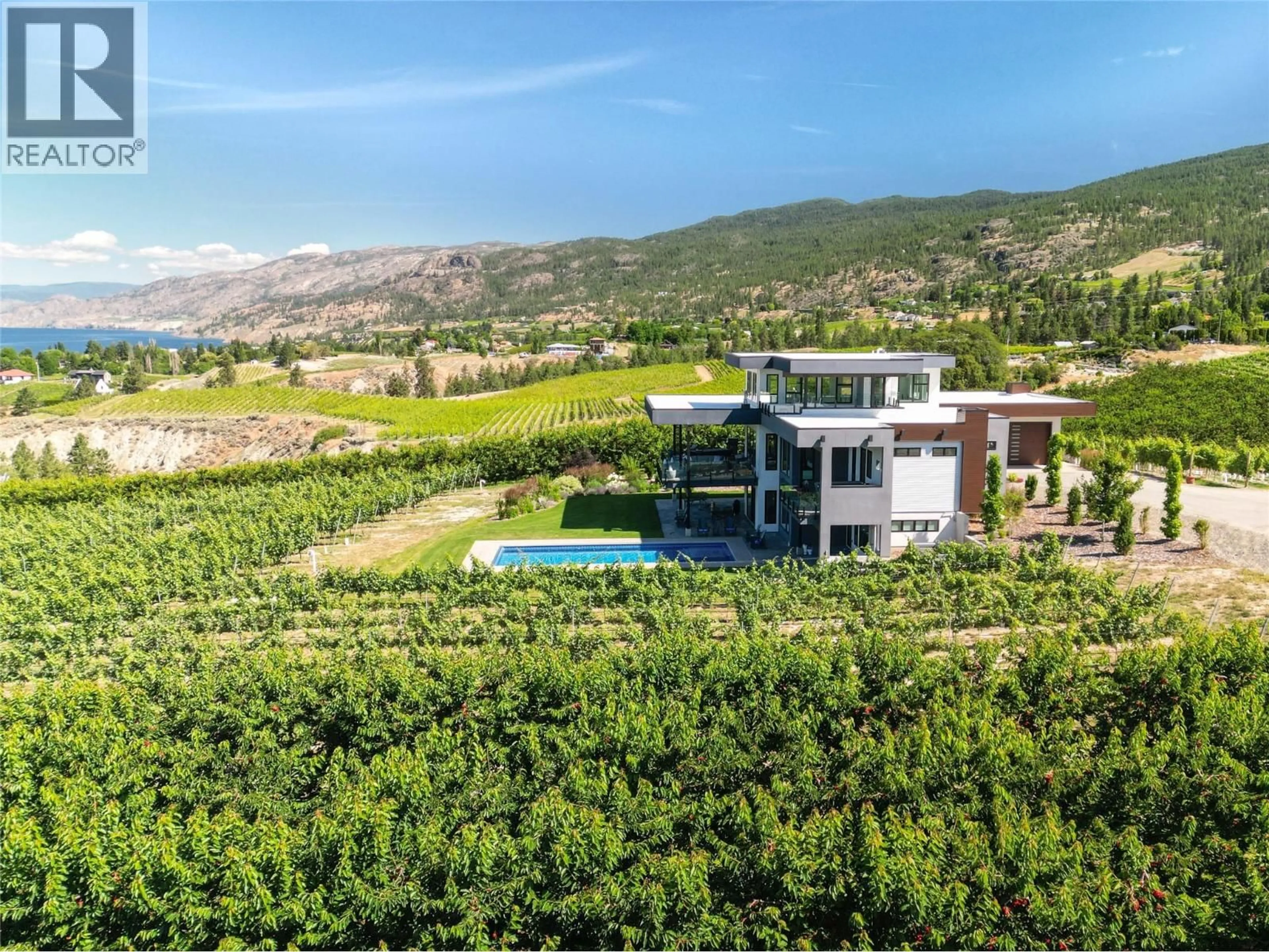 A pic from outside/outdoor area/front of a property/back of a property/a pic from drone, mountain view for 2805 AIKINS LOOP, Naramata British Columbia V0H1N1