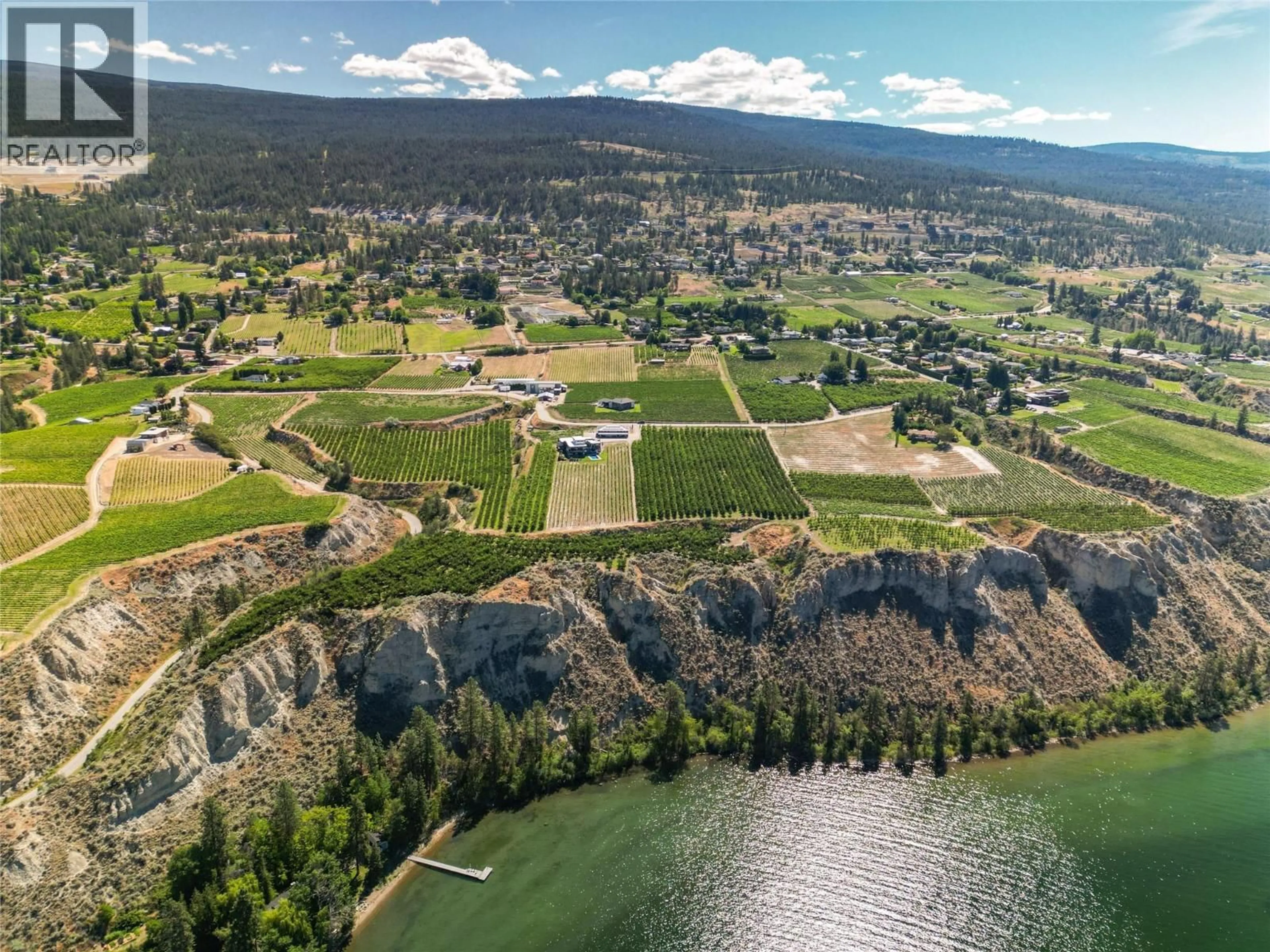 A pic from outside/outdoor area/front of a property/back of a property/a pic from drone, water/lake/river/ocean view for 2805 AIKINS LOOP, Naramata British Columbia V0H1N1