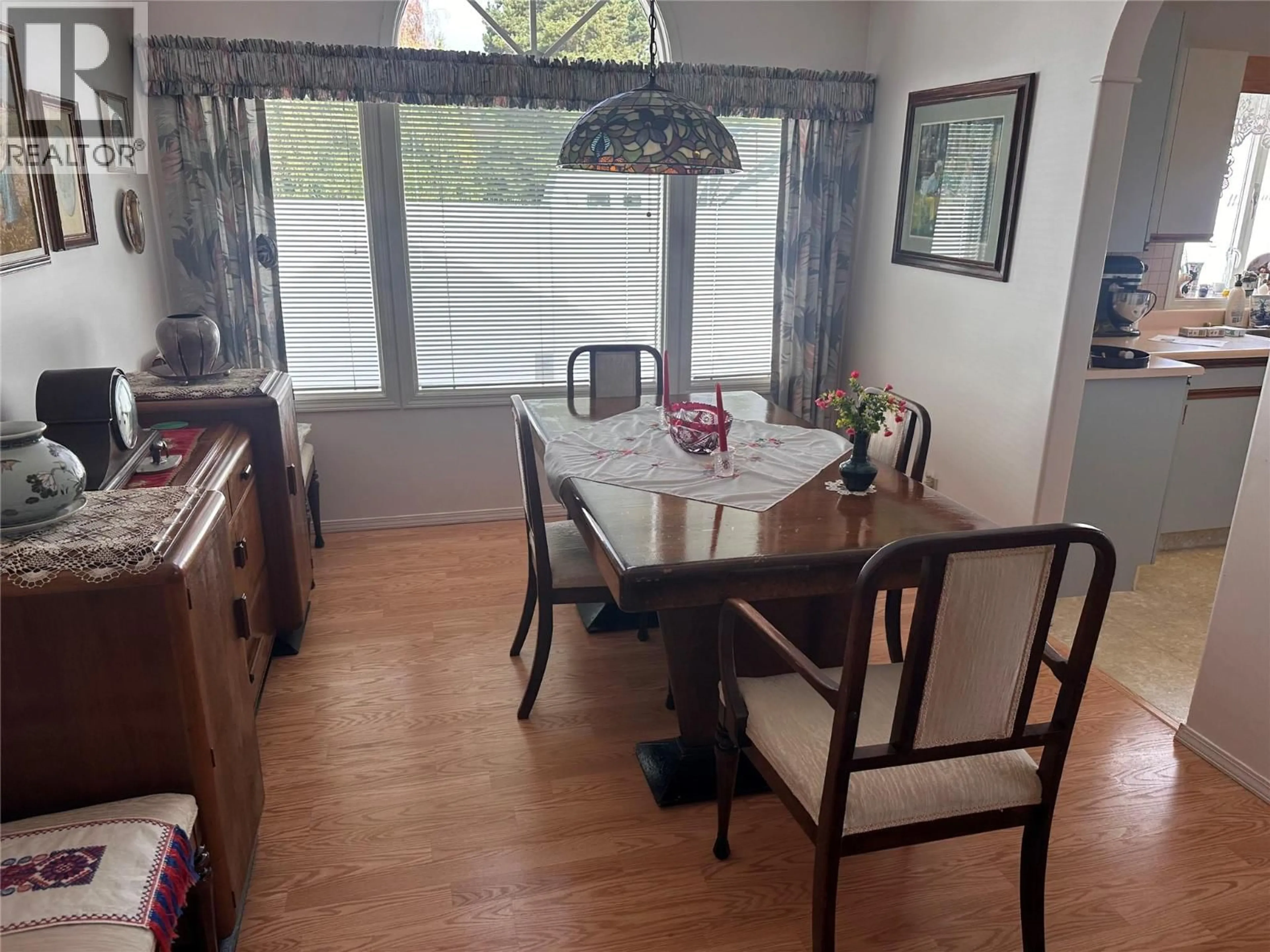Dining room, wood/laminate floor for 12 - 1020 LANFRANCO ROAD, Kelowna British Columbia V1W3W6