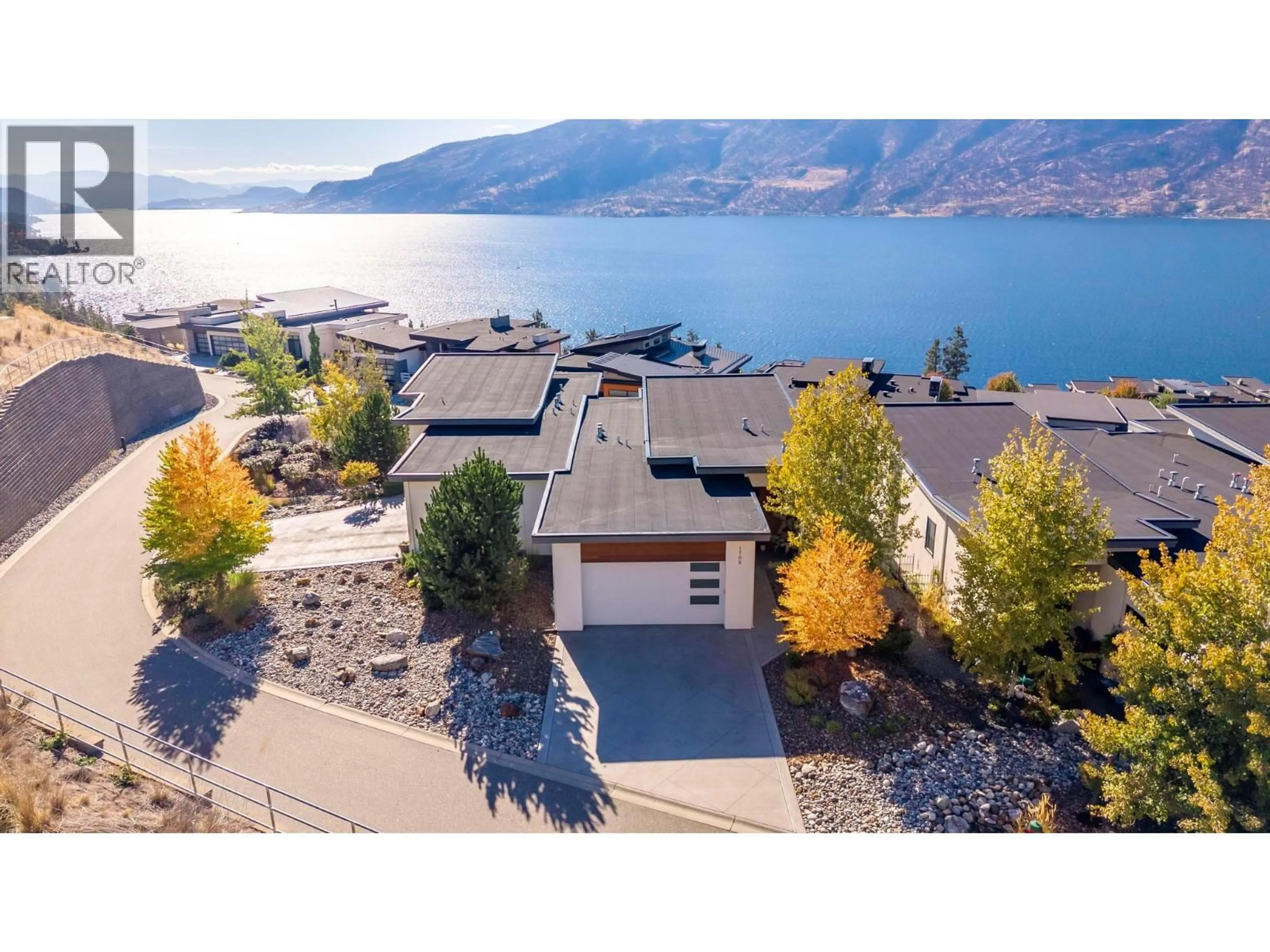 A pic from outside/outdoor area/front of a property/back of a property/a pic from drone, water/lake/river/ocean view for 1768 SLATEVIEW CRESCENT, Lake Country British Columbia V4V2T4