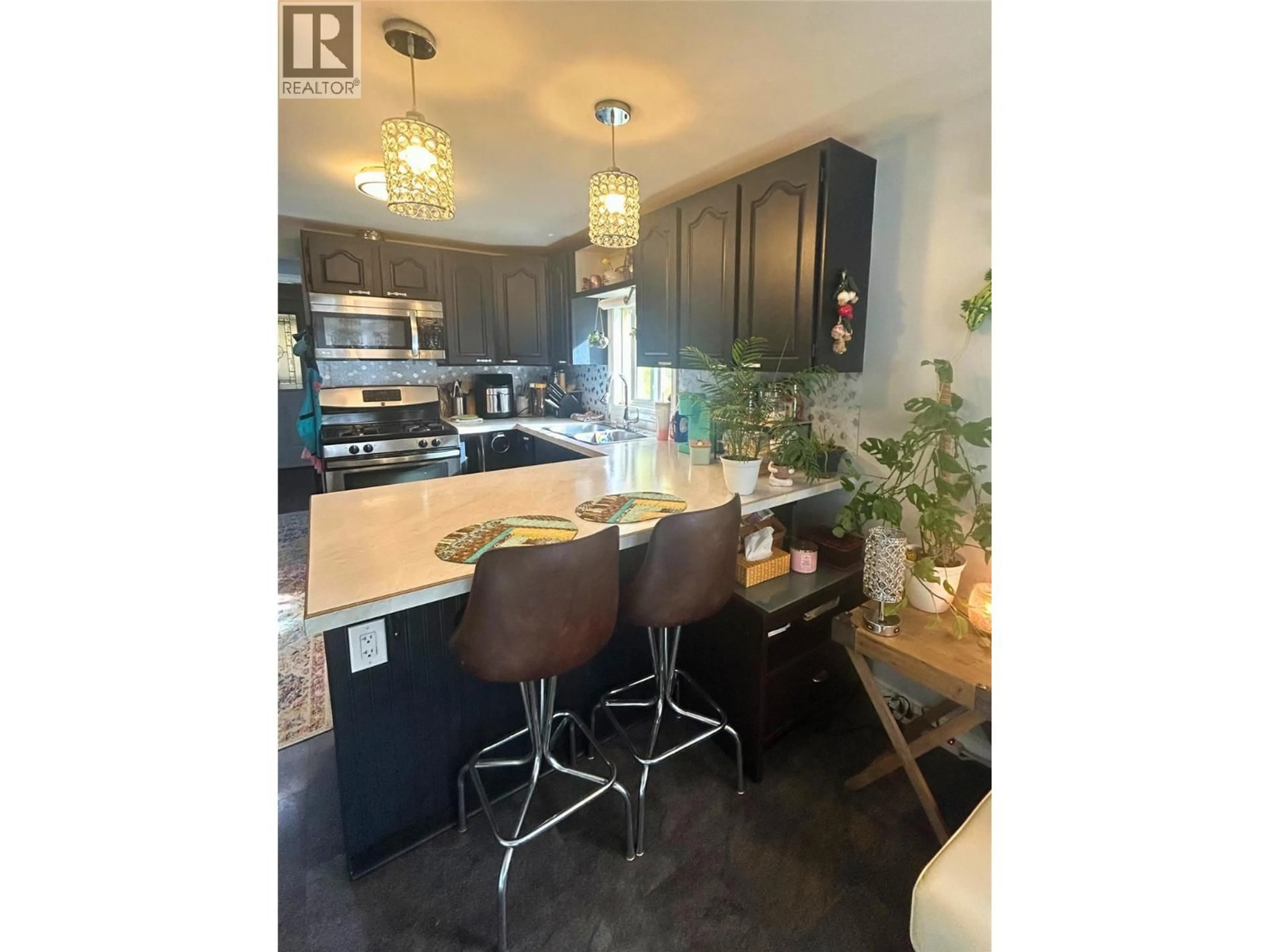 Open concept kitchen, unknown for 10 - 1055 OLD CARIBOO ROAD, Cache Creek British Columbia V0K1H0