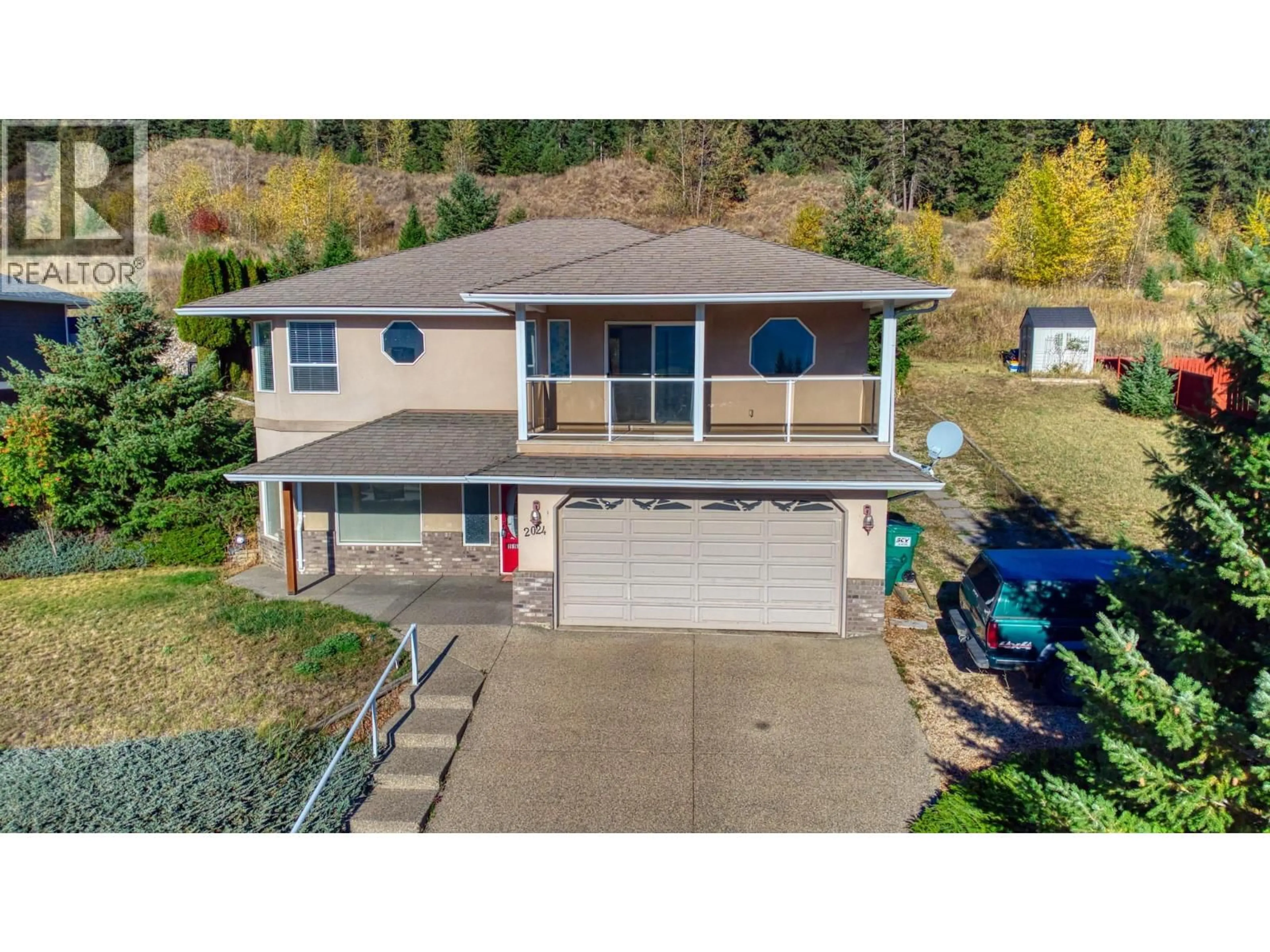 A pic from outside/outdoor area/front of a property/back of a property/a pic from drone, water/lake/river/ocean view for 2024 MOUNTAIN VIEW AVENUE, Lumby British Columbia V0E2G0