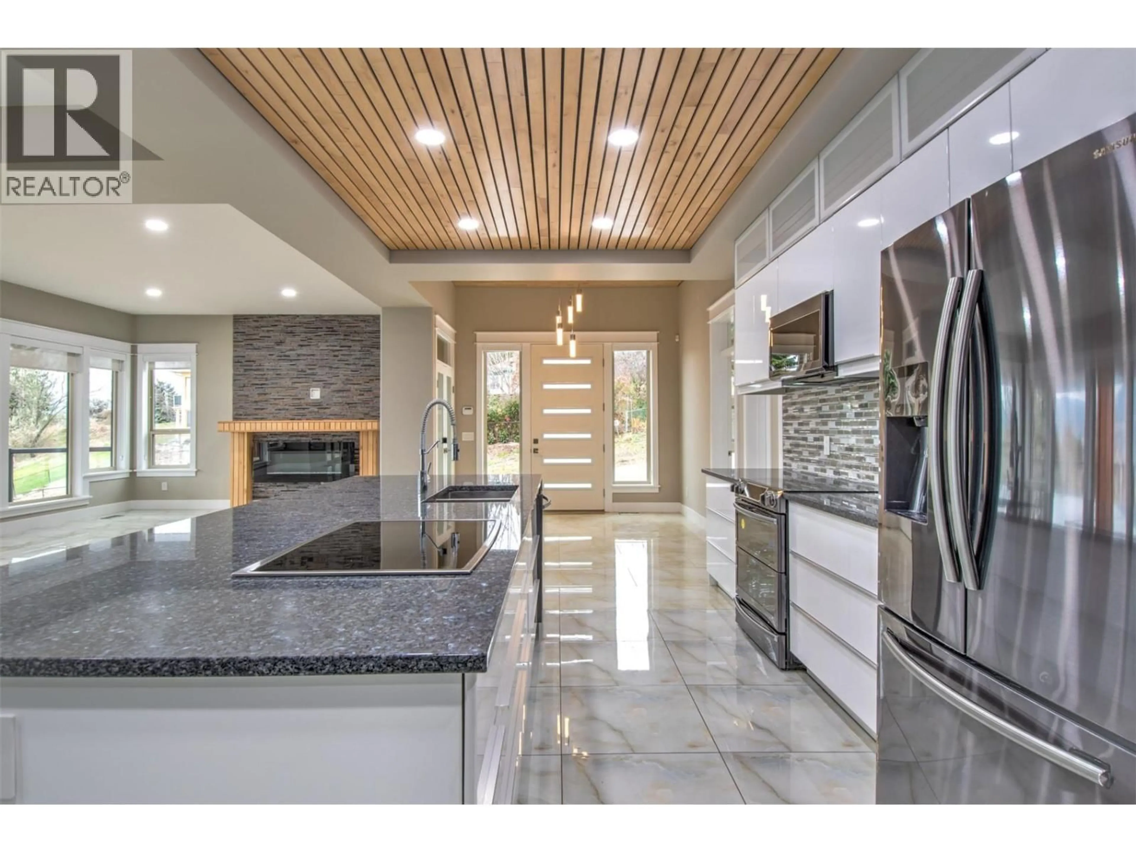 Open concept kitchen, ceramic/tile floor for 7509 KENNEDY LANE LANE, Vernon British Columbia V1H1C4