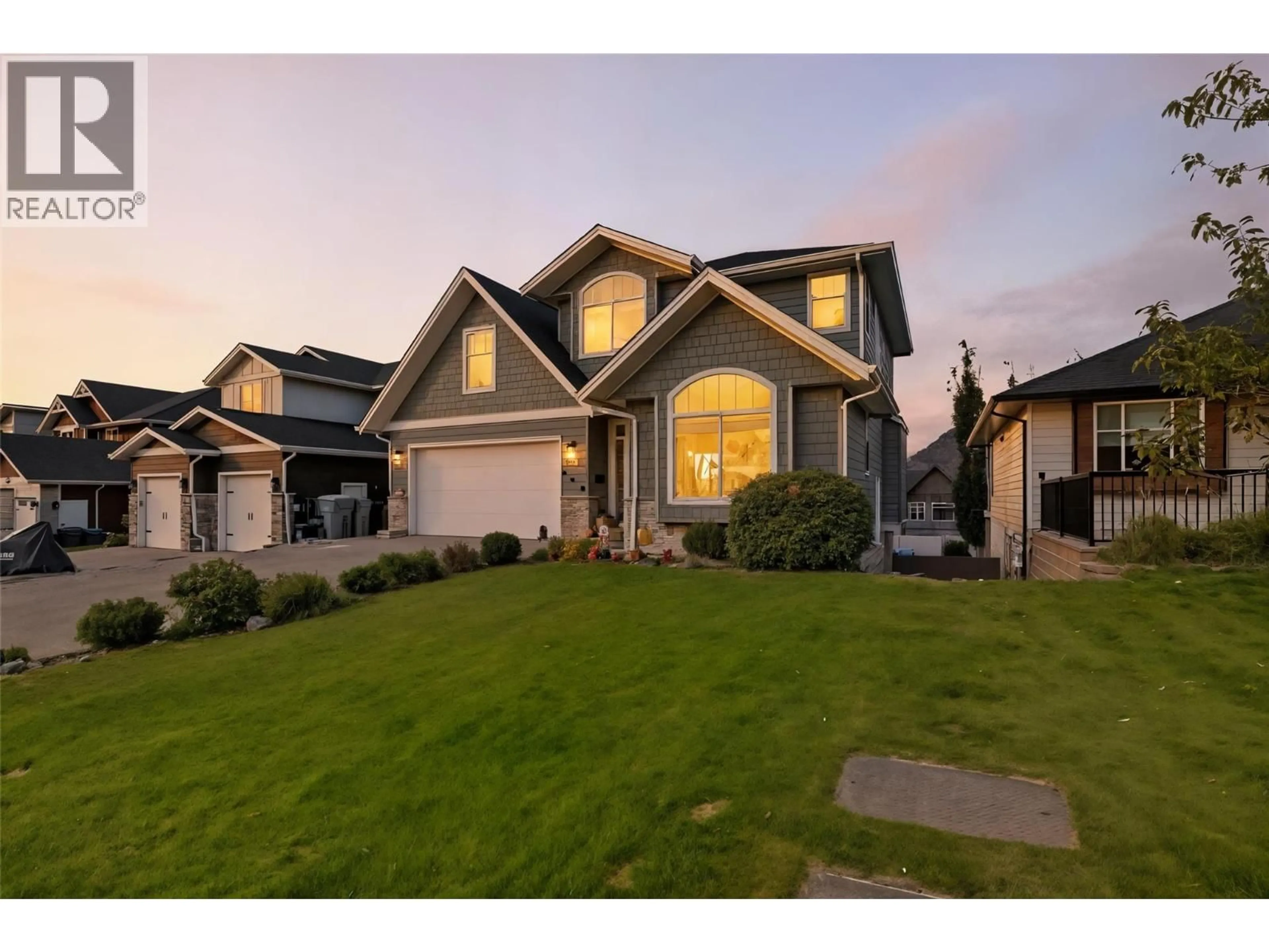 Home with vinyl exterior material, street for 1553 EMERALD DRIVE, Kamloops British Columbia V2E0C4