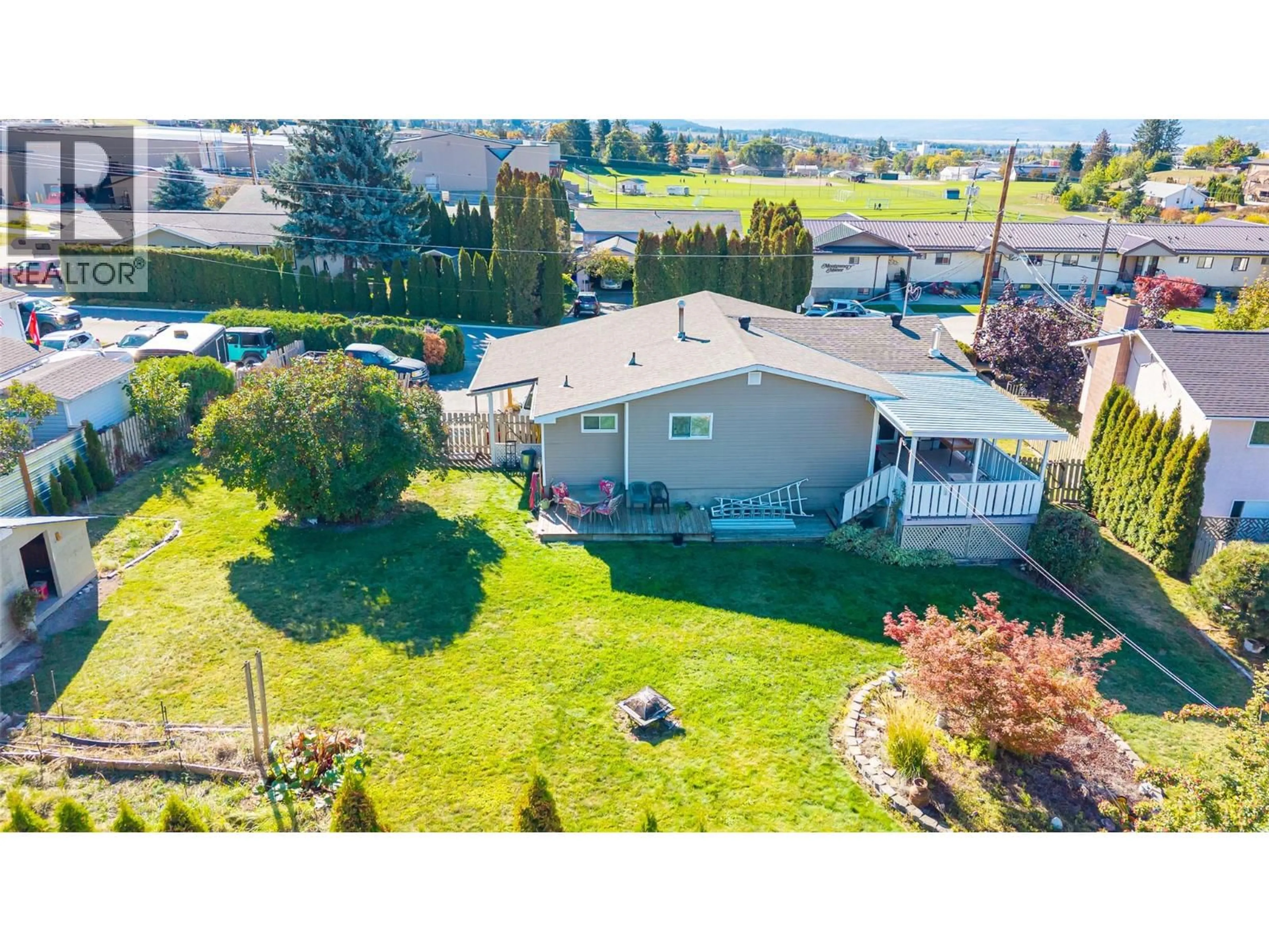 A pic from outside/outdoor area/front of a property/back of a property/a pic from drone, water/lake/river/ocean view for 1832 HURL STREET, Creston British Columbia V0B1G5