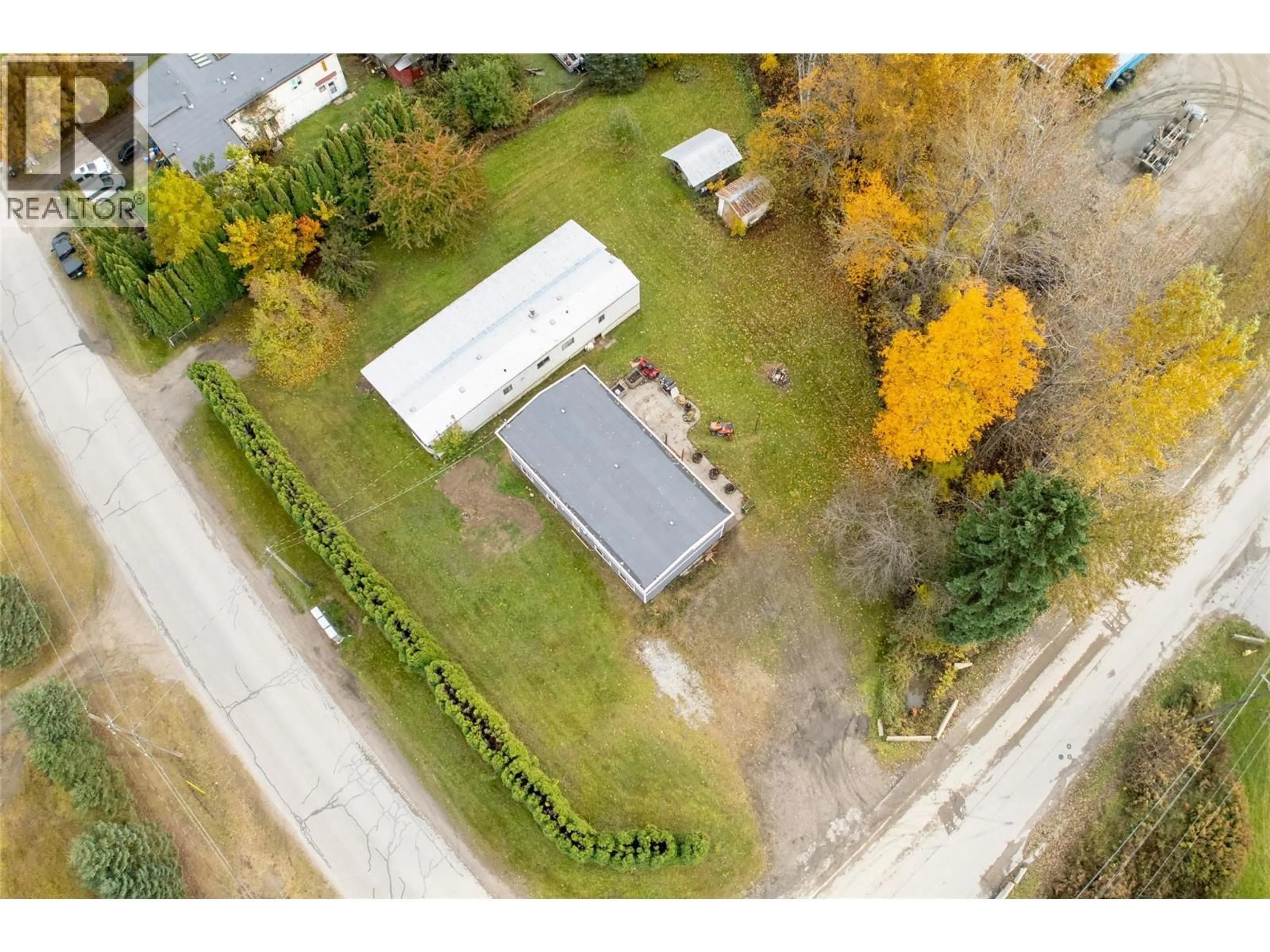 A pic from outside/outdoor area/front of a property/back of a property/a pic from drone, street for 712 BEGBIE ROAD, Revelstoke British Columbia V0E2S0