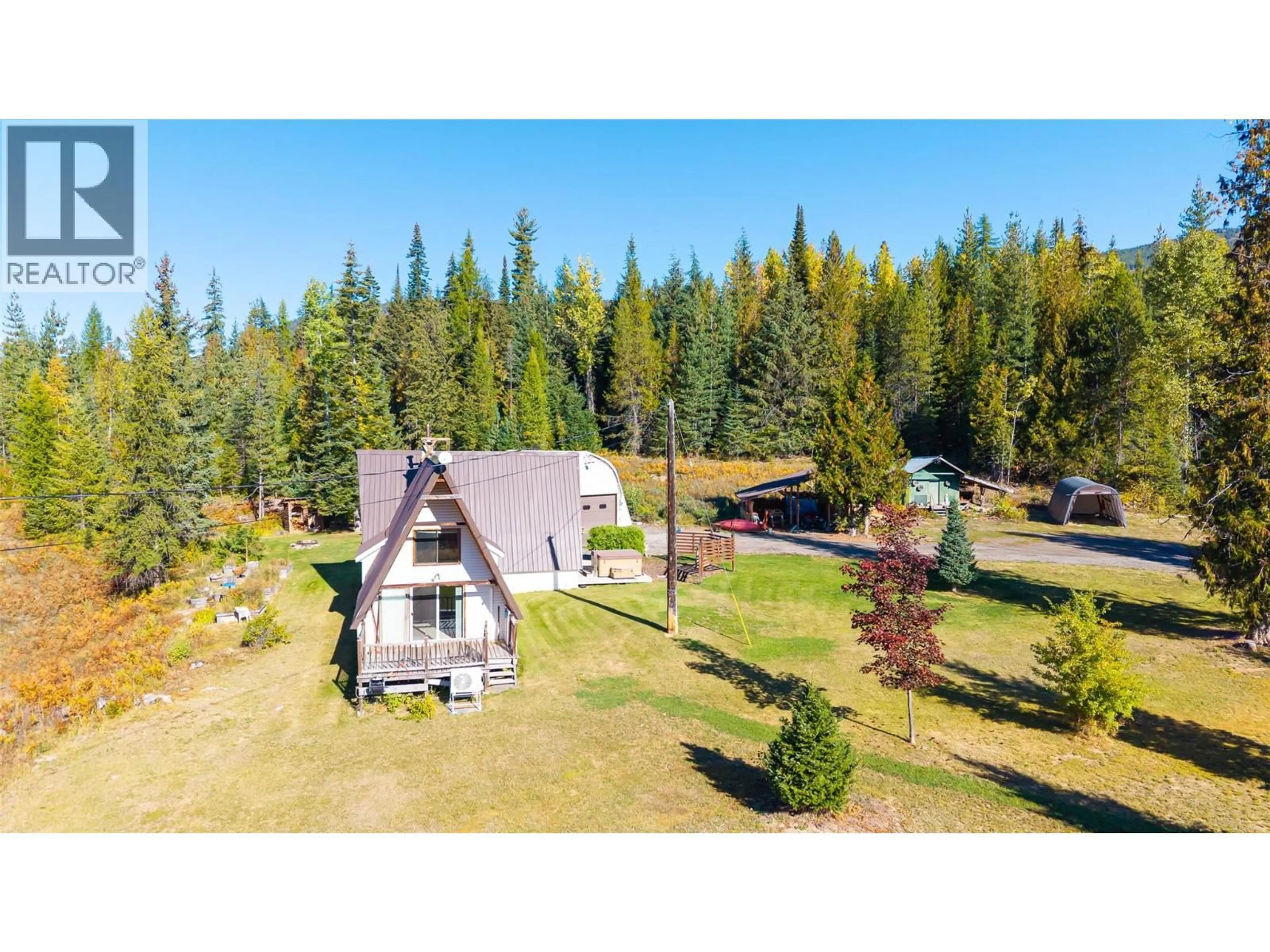 A pic from outside/outdoor area/front of a property/back of a property/a pic from drone, unknown for 7698 3 HIGHWAY, Yahk British Columbia V0B2P0