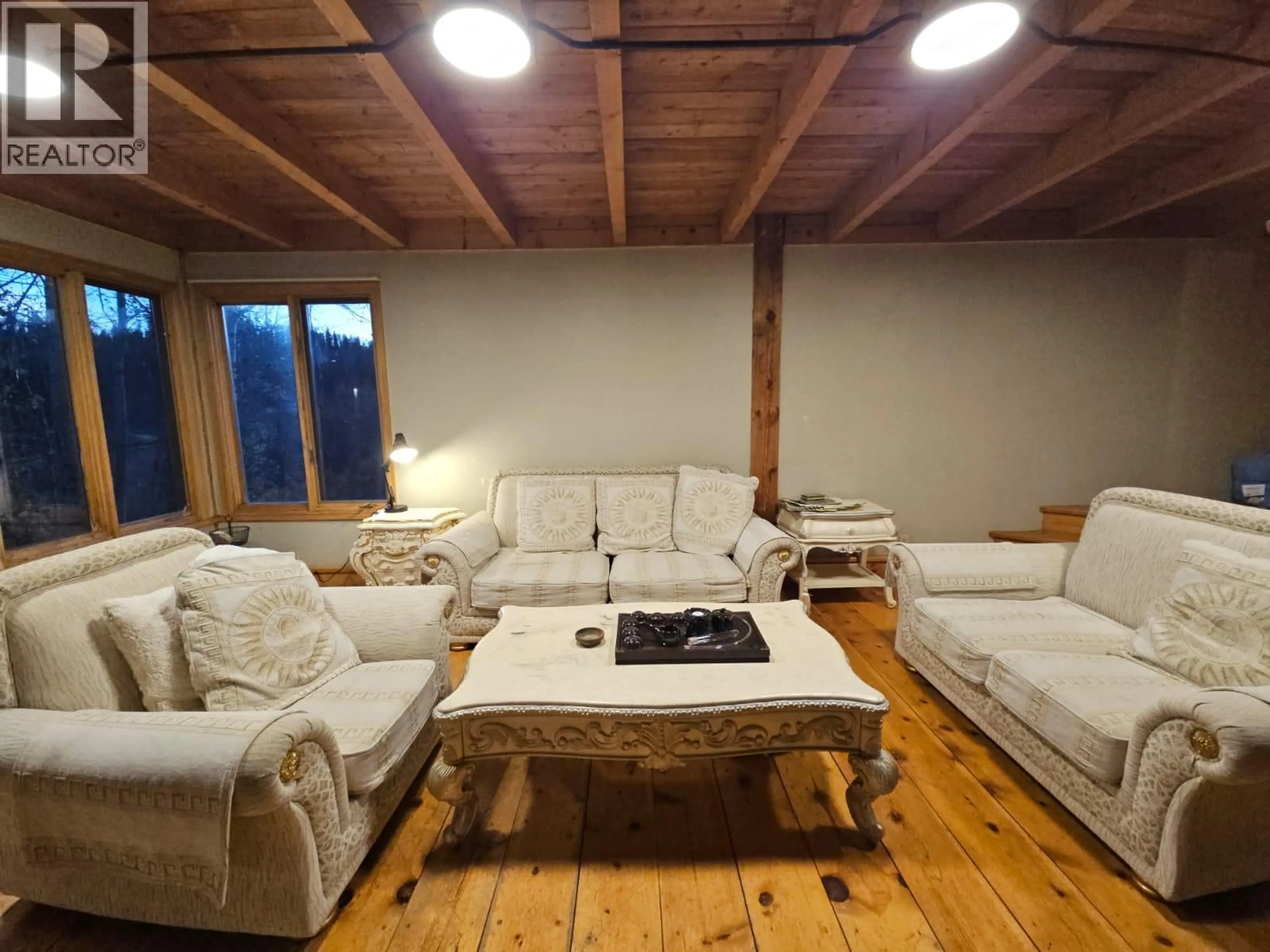Living room with furniture, wood/laminate floor for 2601 CALLIOU ROAD, Chetwynd British Columbia V0C1J0