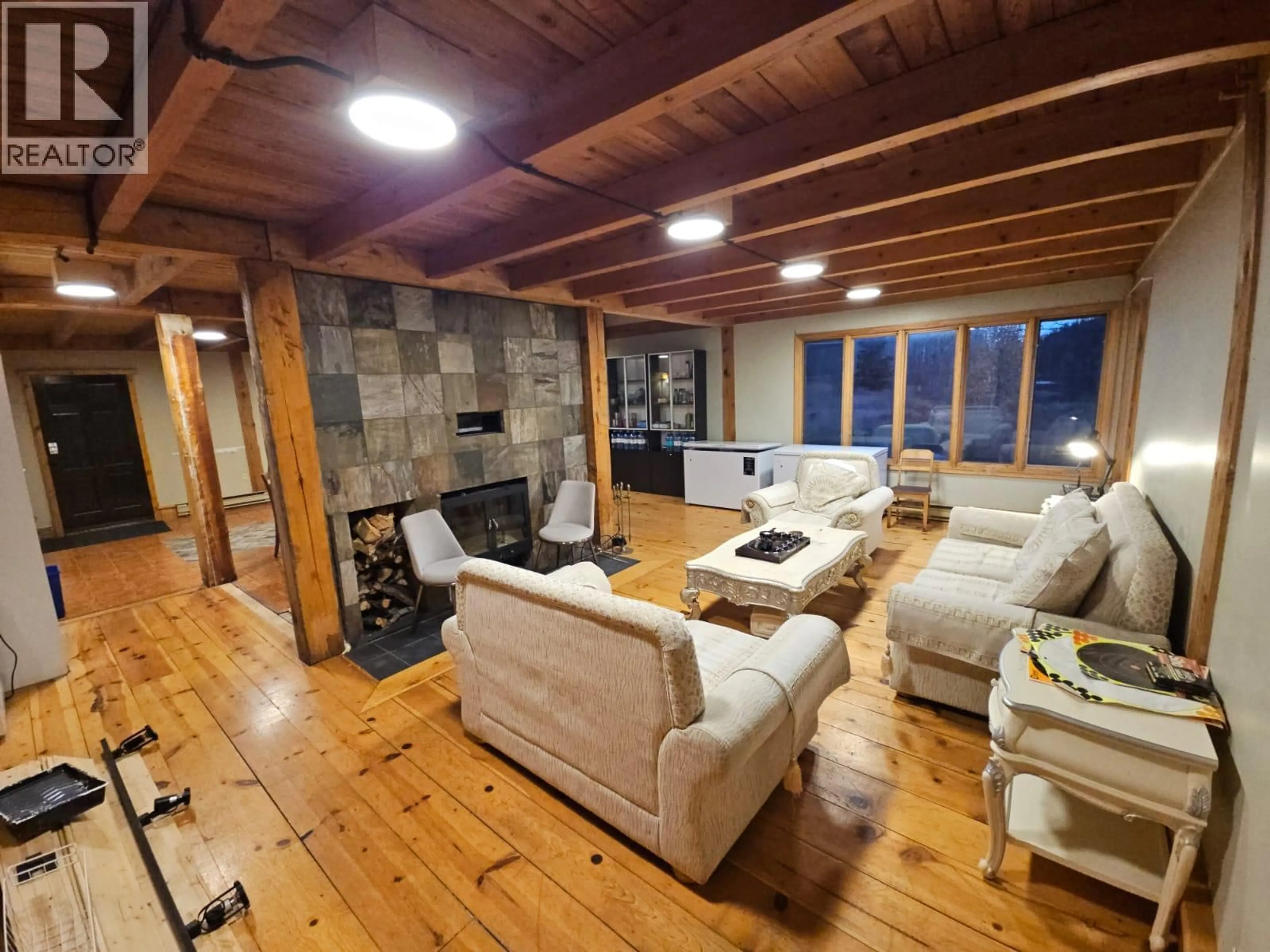 Living room with furniture, wood/laminate floor for 2601 CALLIOU ROAD, Chetwynd British Columbia V0C1J0