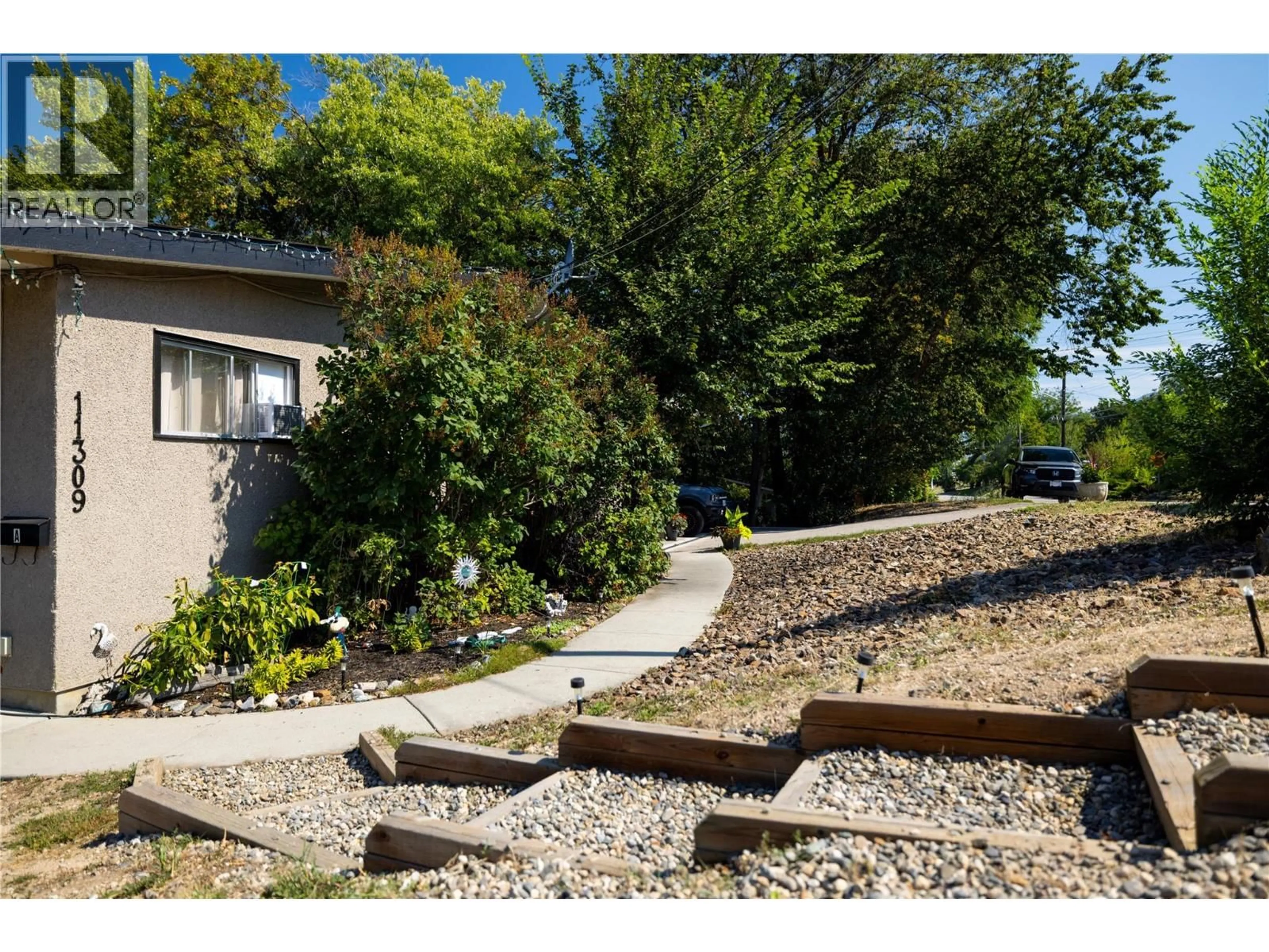 A pic from outside/outdoor area/front of a property/back of a property/a pic from drone, street for 11309 COLDSTREAM CREEK ROAD, Coldstream British Columbia V1B1E1