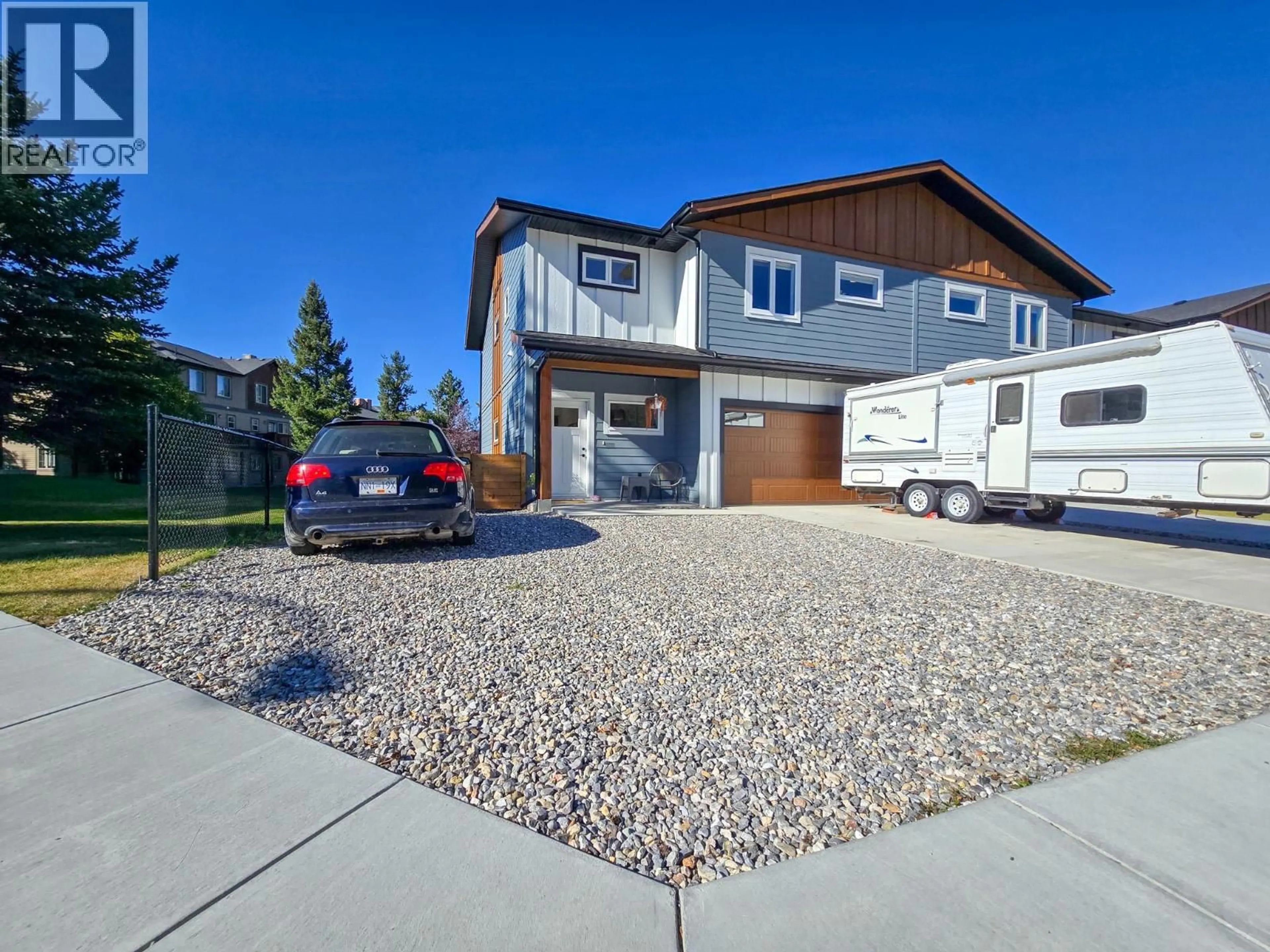 Home with vinyl exterior material, street for 4 - 4830 RIDGE ROAD, Radium Hot Springs British Columbia V0A1M0