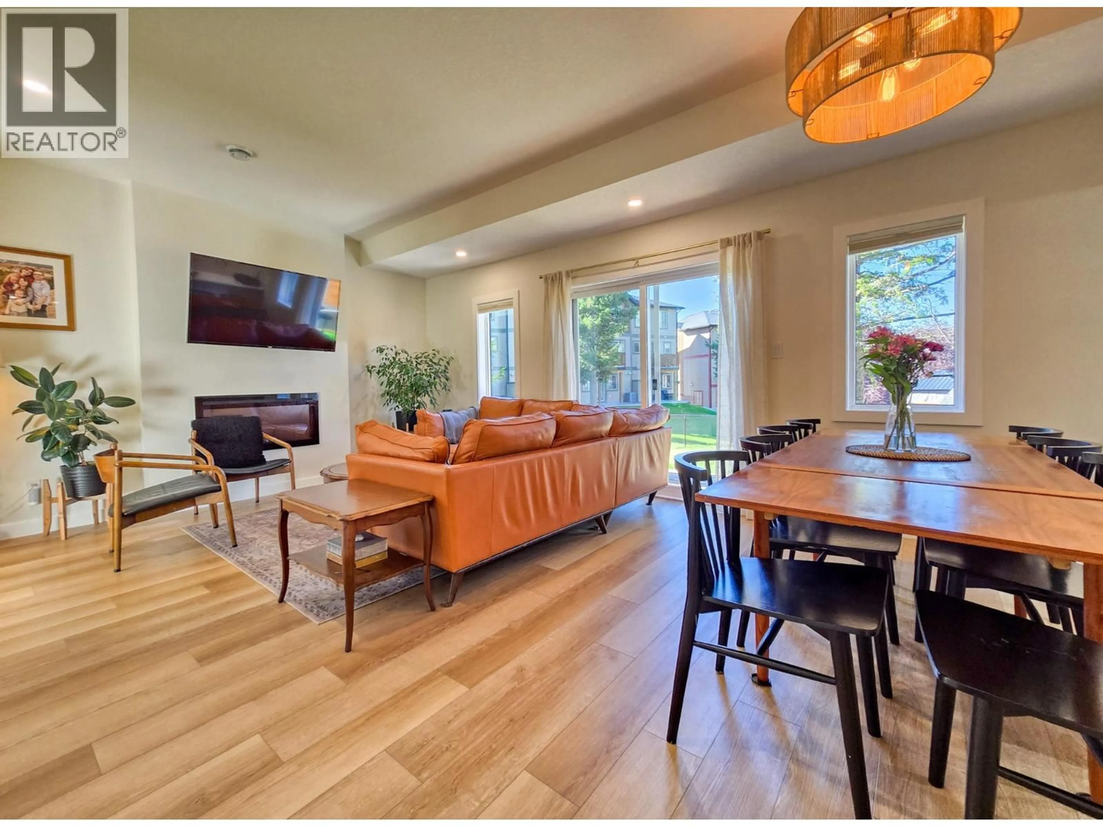 Living room with furniture, wood/laminate floor for 4 - 4830 RIDGE ROAD, Radium Hot Springs British Columbia V0A1M0