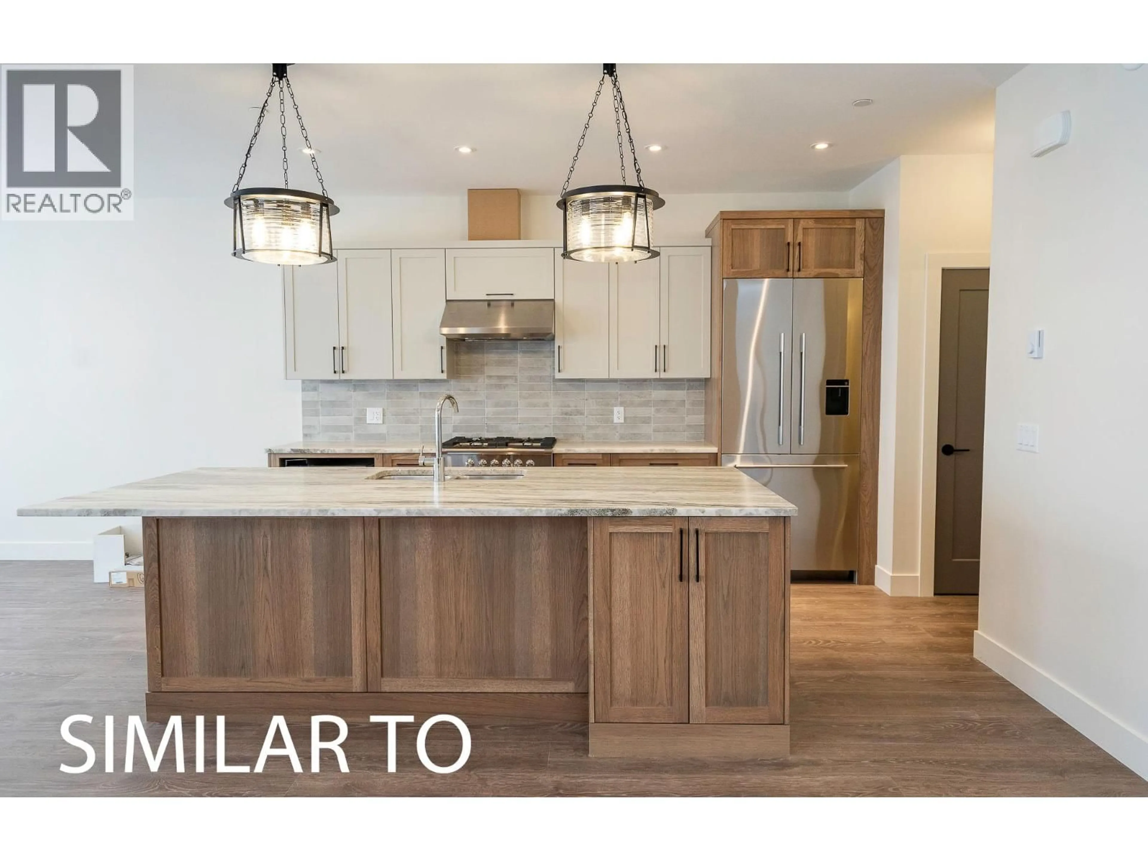 Open concept kitchen, unknown for 215B GRIZZLY RIDGE TRAIL, Big White British Columbia V1P1P4