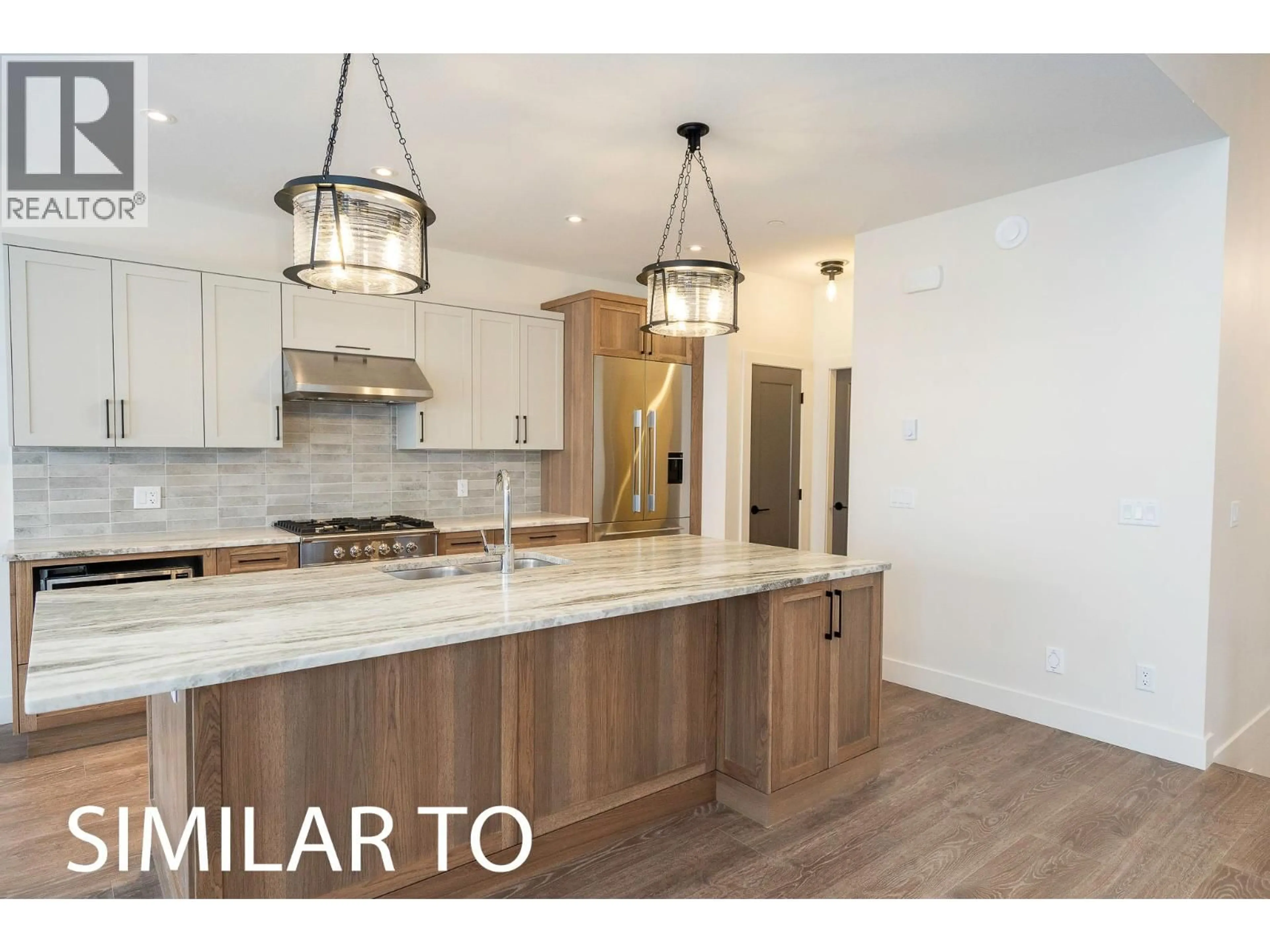 Open concept kitchen, unknown for 215B GRIZZLY RIDGE TRAIL, Big White British Columbia V1P1P4