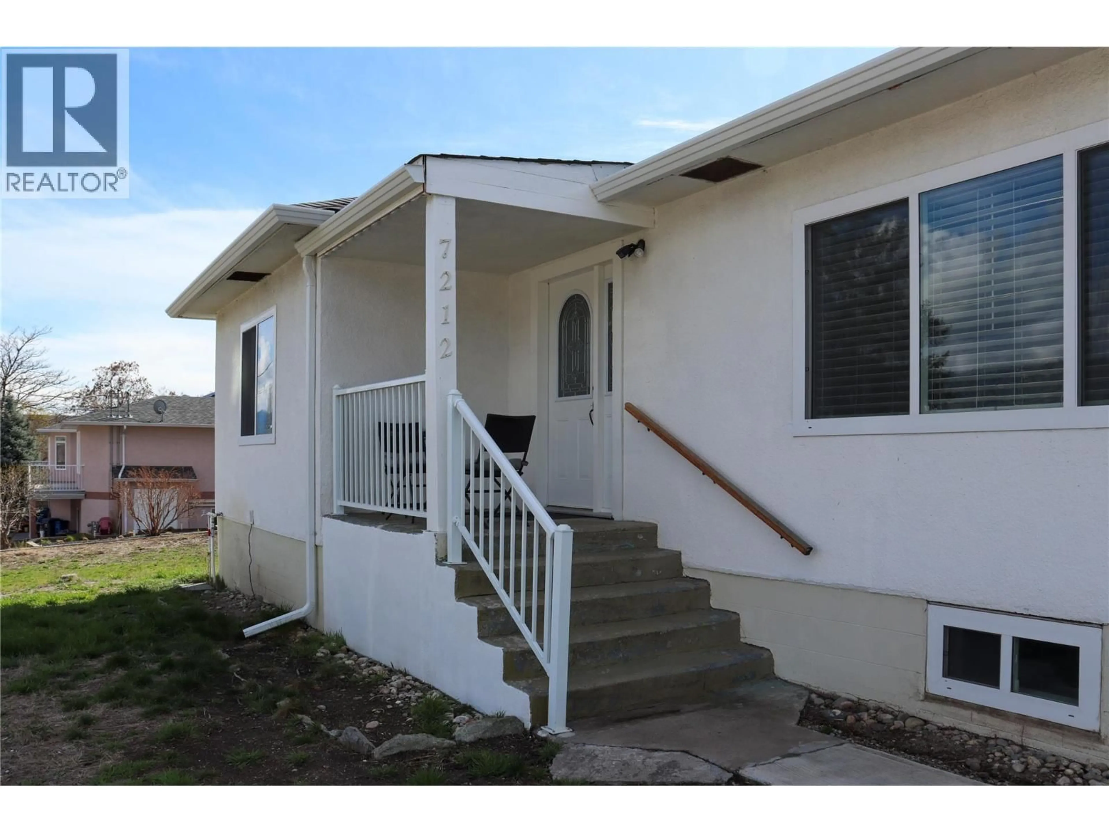 Home with vinyl exterior material, street for 7212 HERON LANE, Osoyoos British Columbia V0H1V0