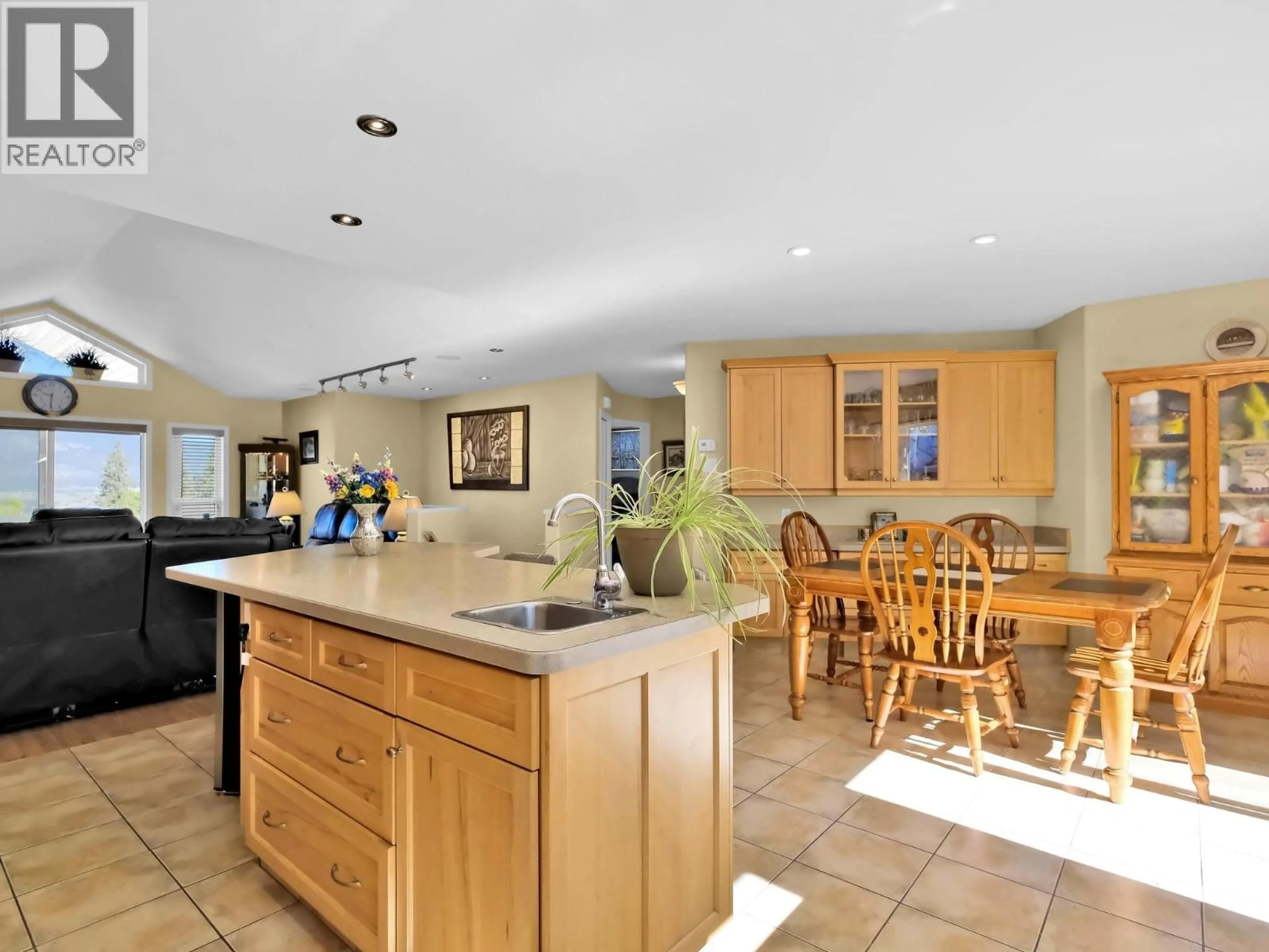 Open concept kitchen, ceramic/tile floor for 102 - 695 PINEVIEW ROAD, Penticton British Columbia V2A7S8