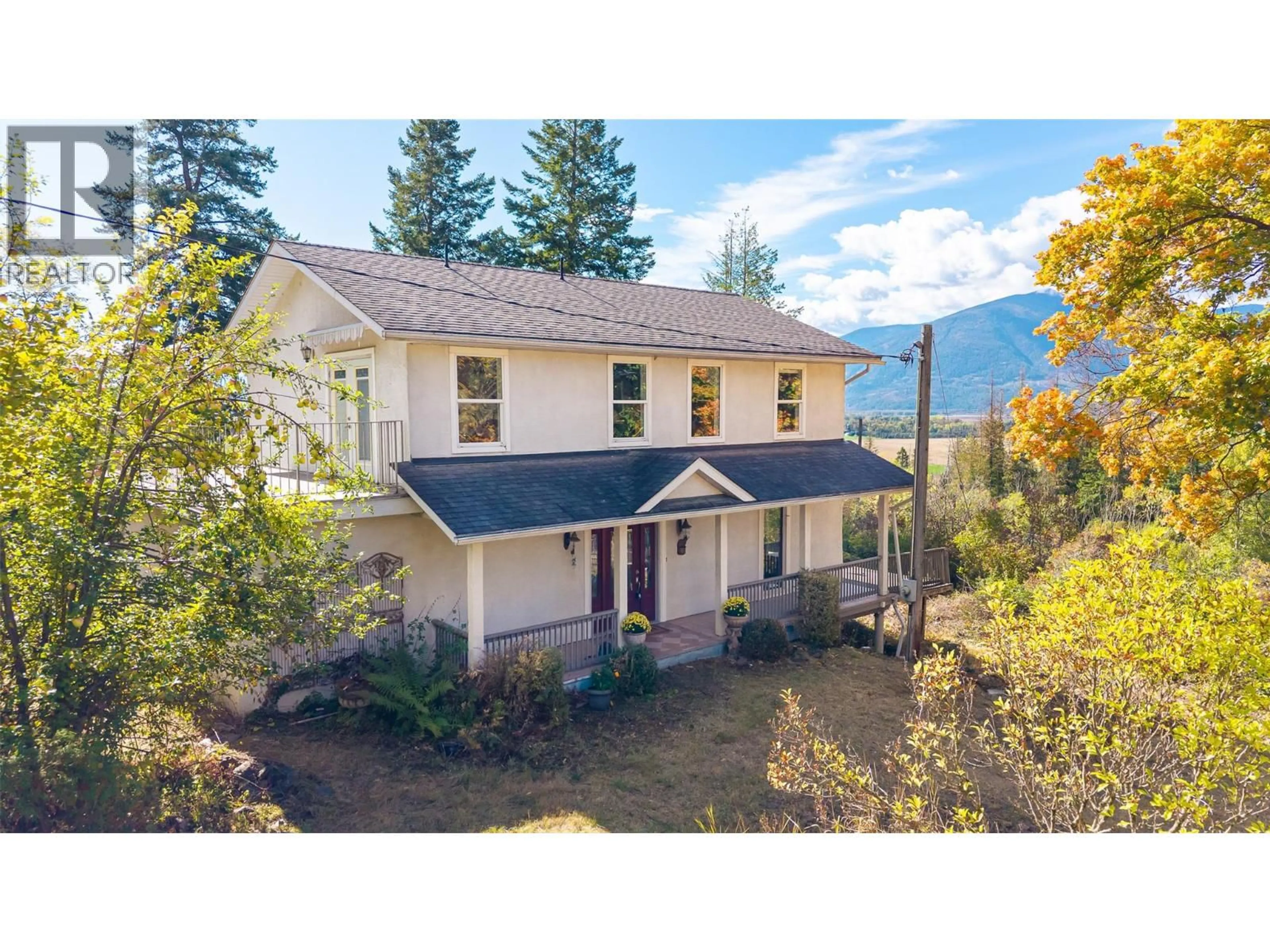 A pic from outside/outdoor area/front of a property/back of a property/a pic from drone, mountain view for 5662 3A HIGHWAY, Wynndel British Columbia V0B2N2